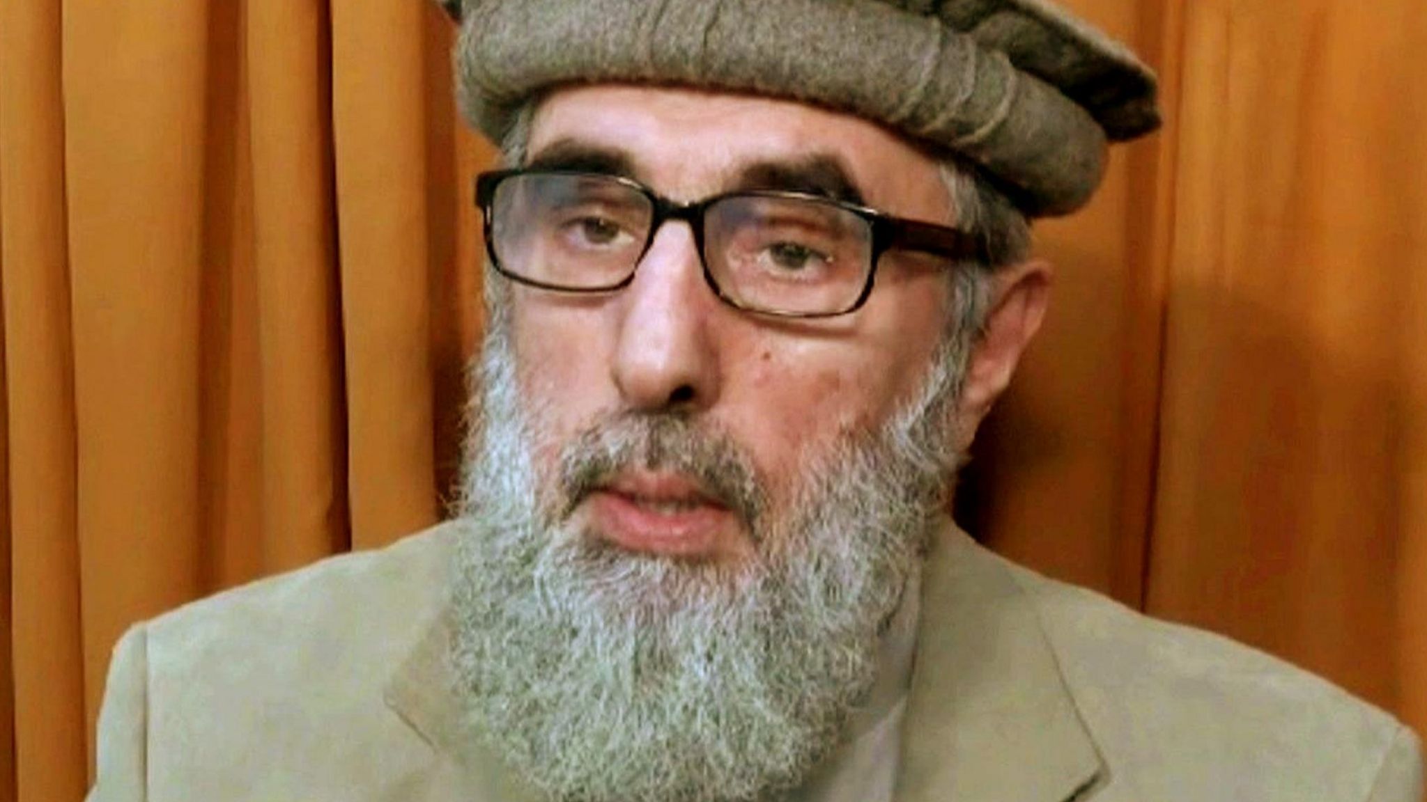 Still from video released to AP in November 2015 shows Afghan warlord Gulbuddin Hekmatyar, now in his late 60s, in an undisclosed location.