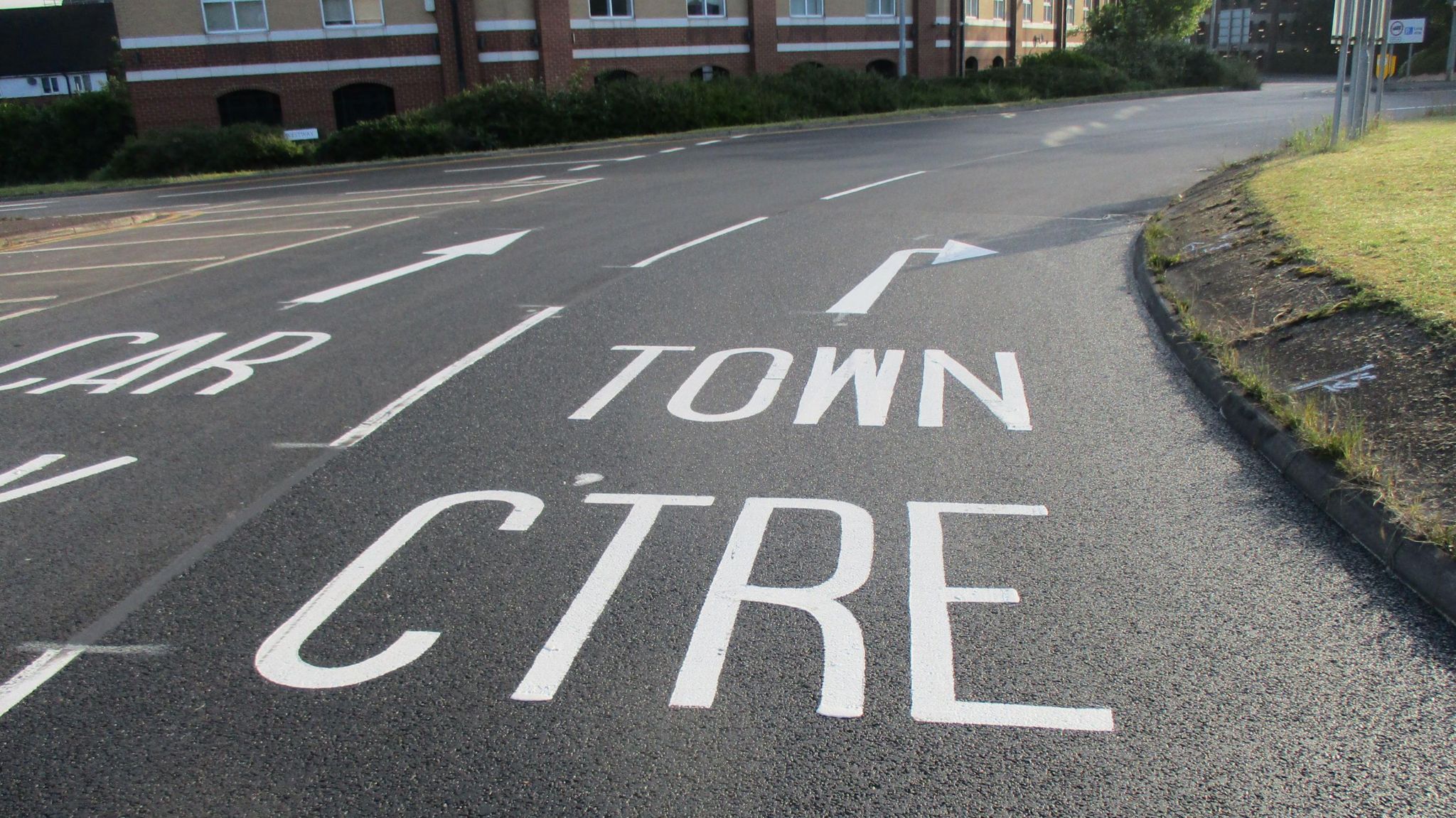 Road markings which read "town centre" when they should read "city centre"