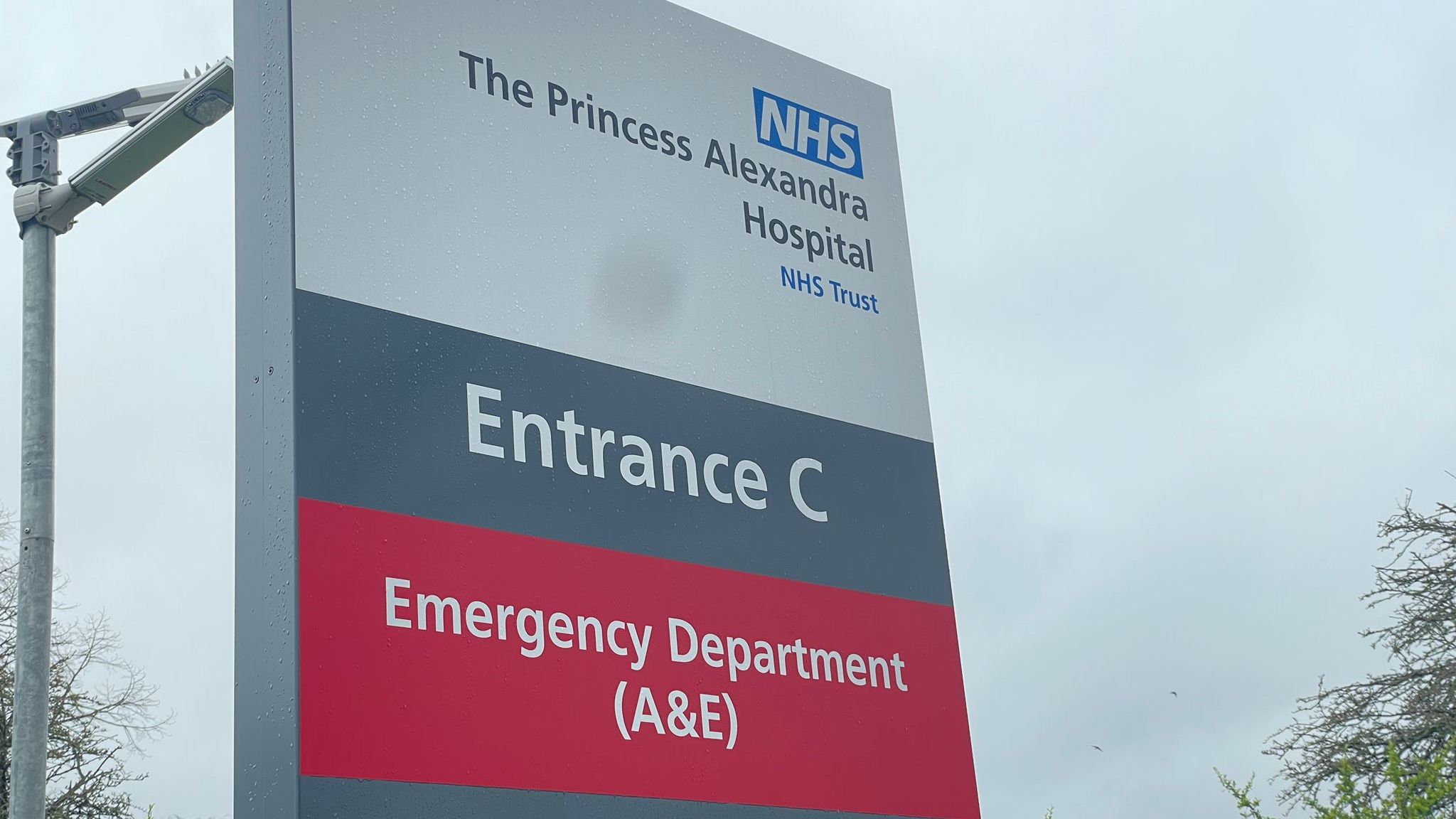 An entrance sign for the Princess Alexandra Hospital's A&E department