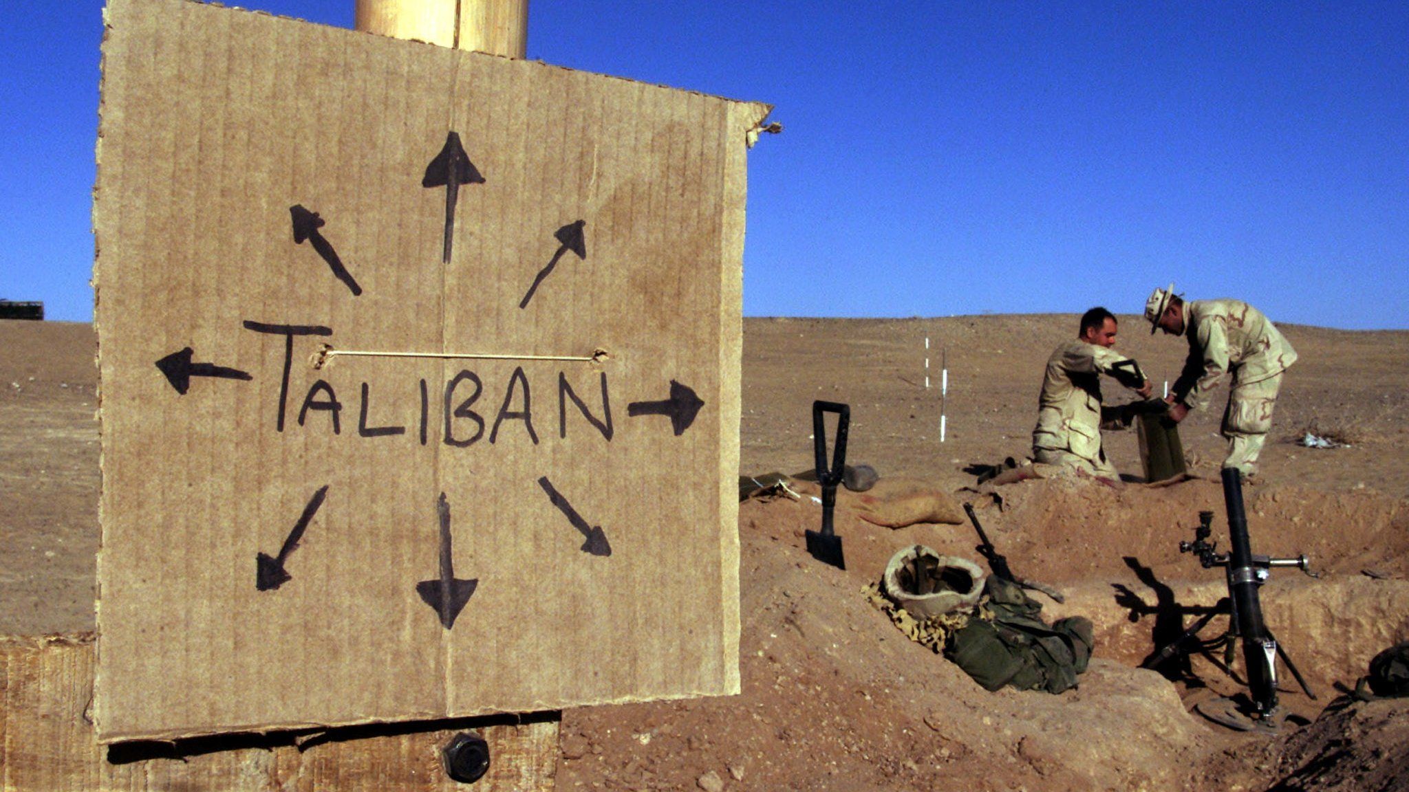A sign reading "Taliban" at a US marine outpost in Afghanistan, 2001