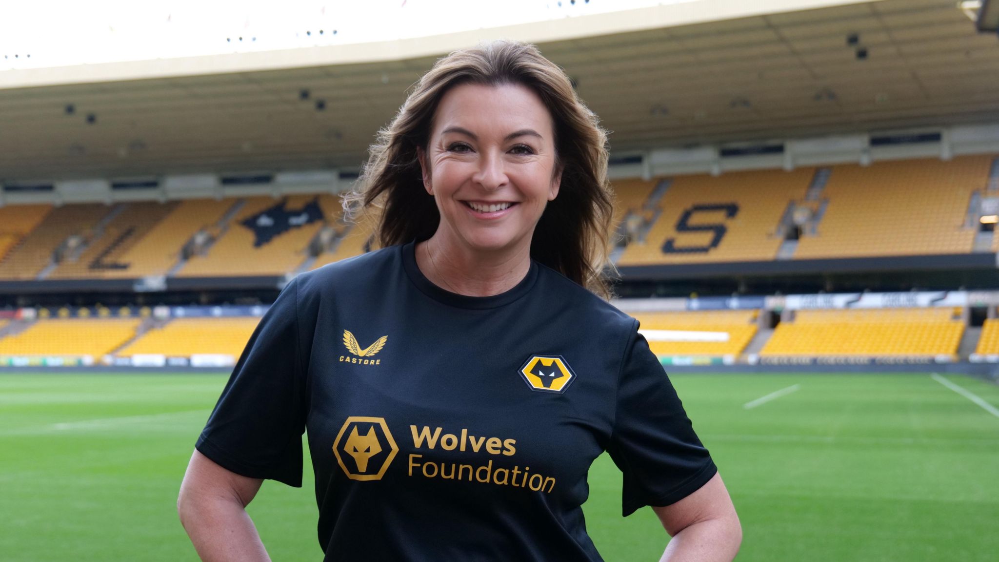 Suzi Perry at Molineux stadium in a Wolves Foundation shirt