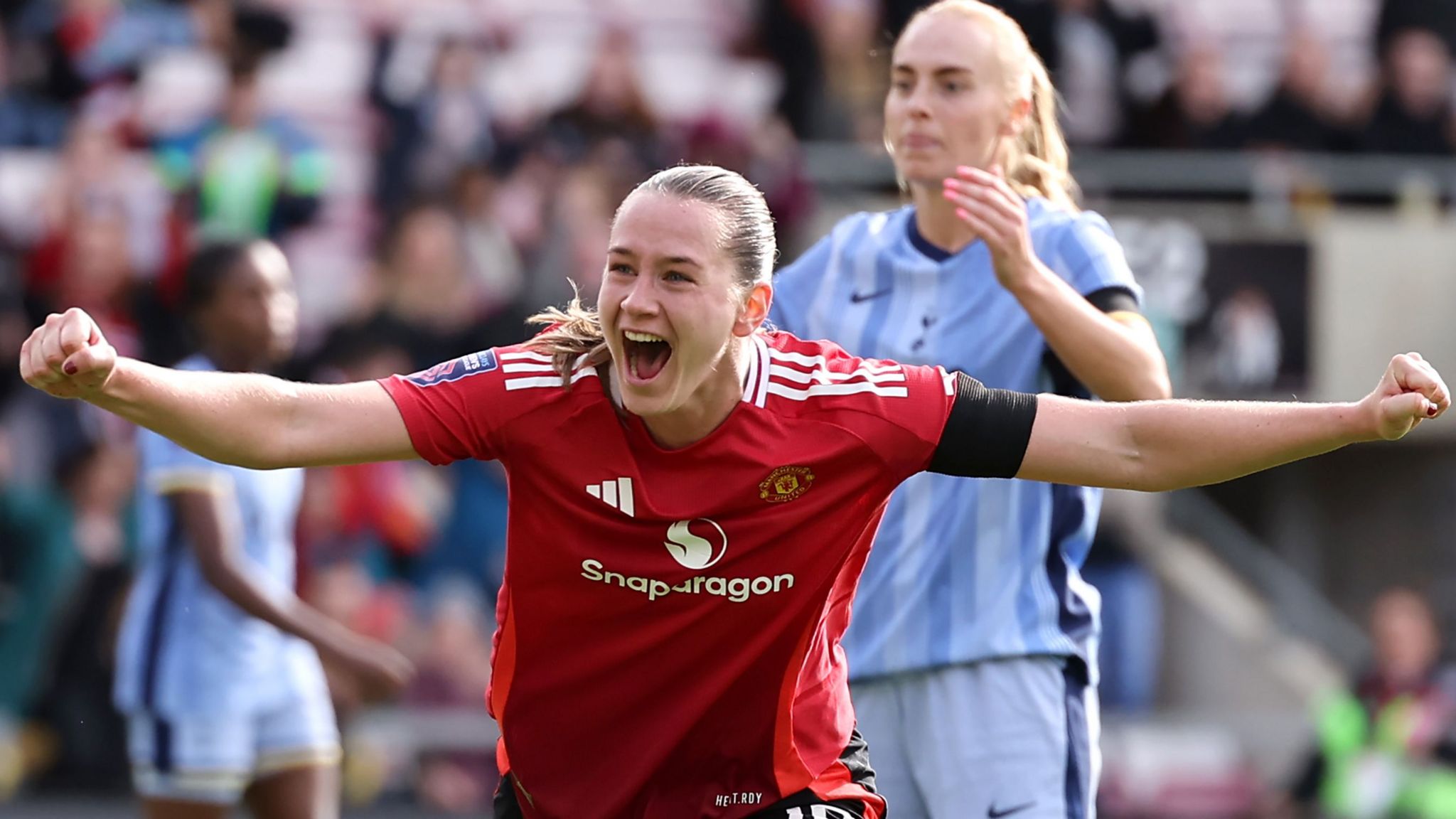 Elisabeth Terland celebrates scoring for Manchester United against Tottenham