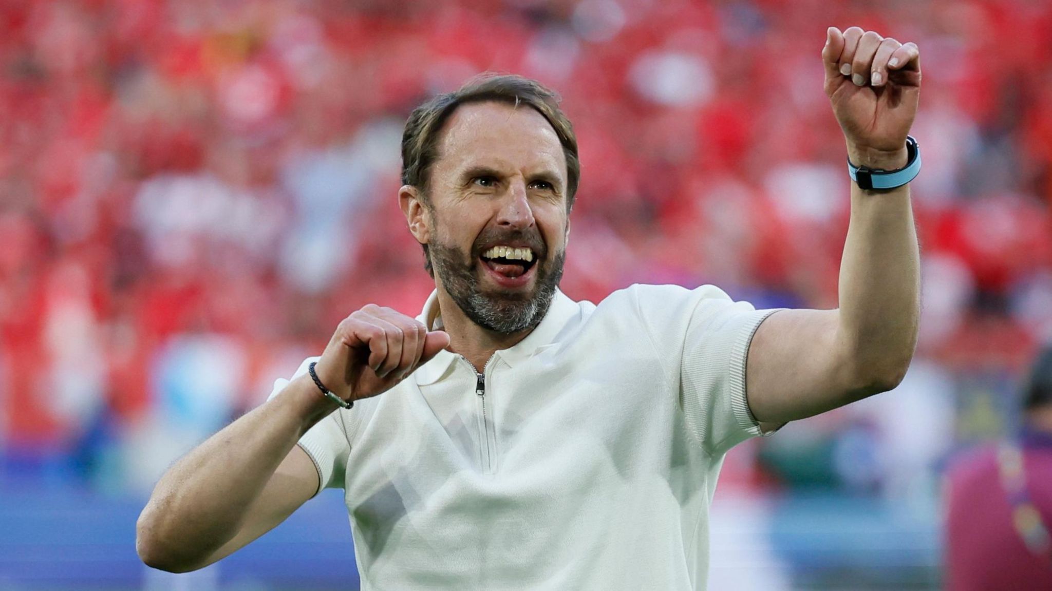 Gareth Southgate celebrates after beating Switzerland