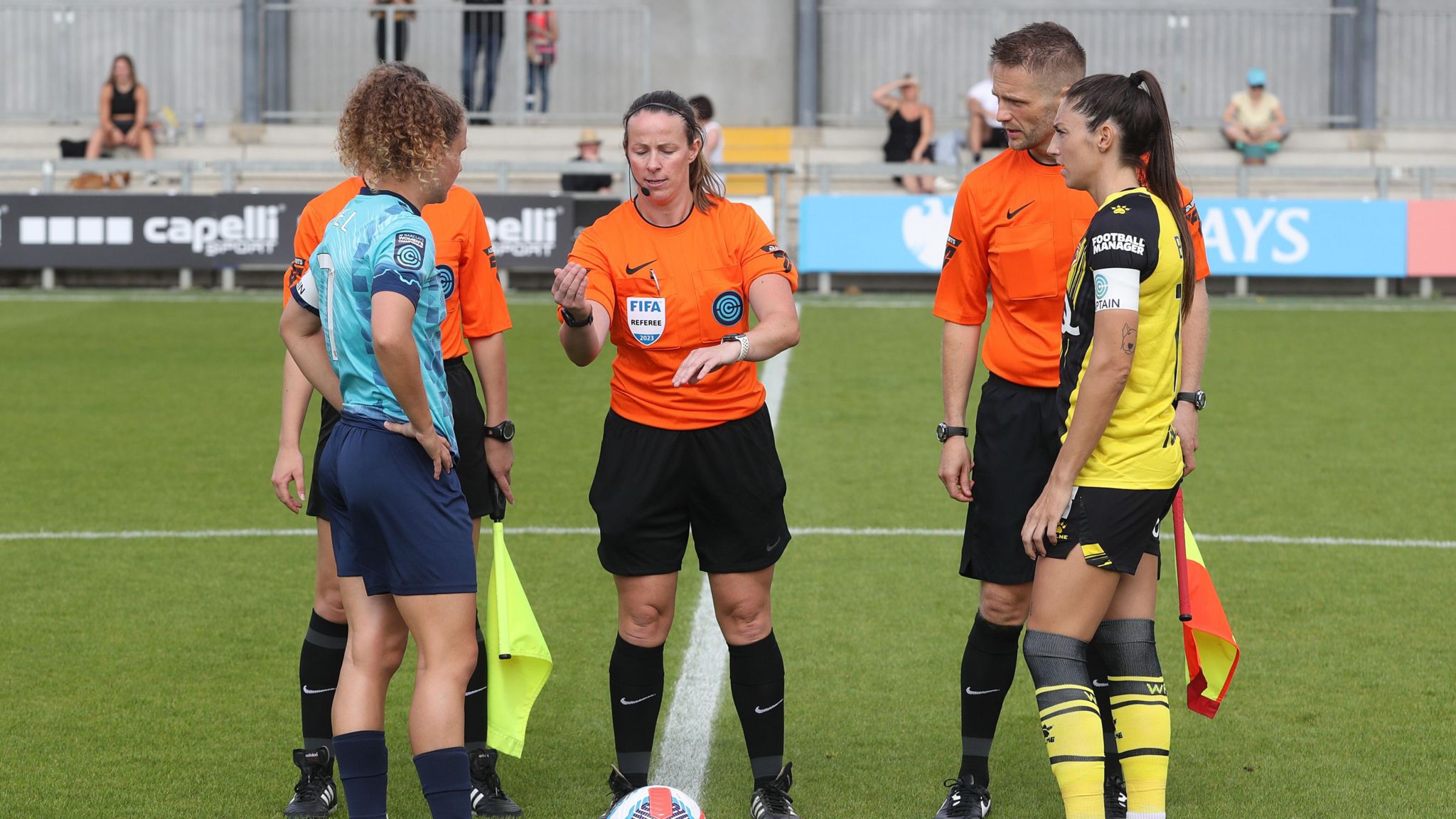 Ms Pearson tossing a coin ahead of a game
