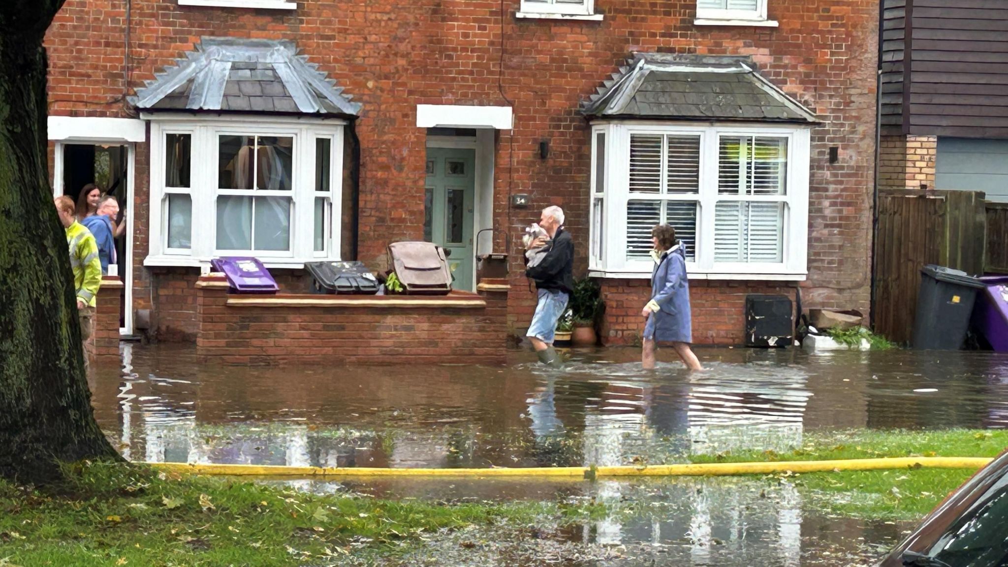 Homes are flooded on Woolgrove Road along the River Purwell in Hitchin