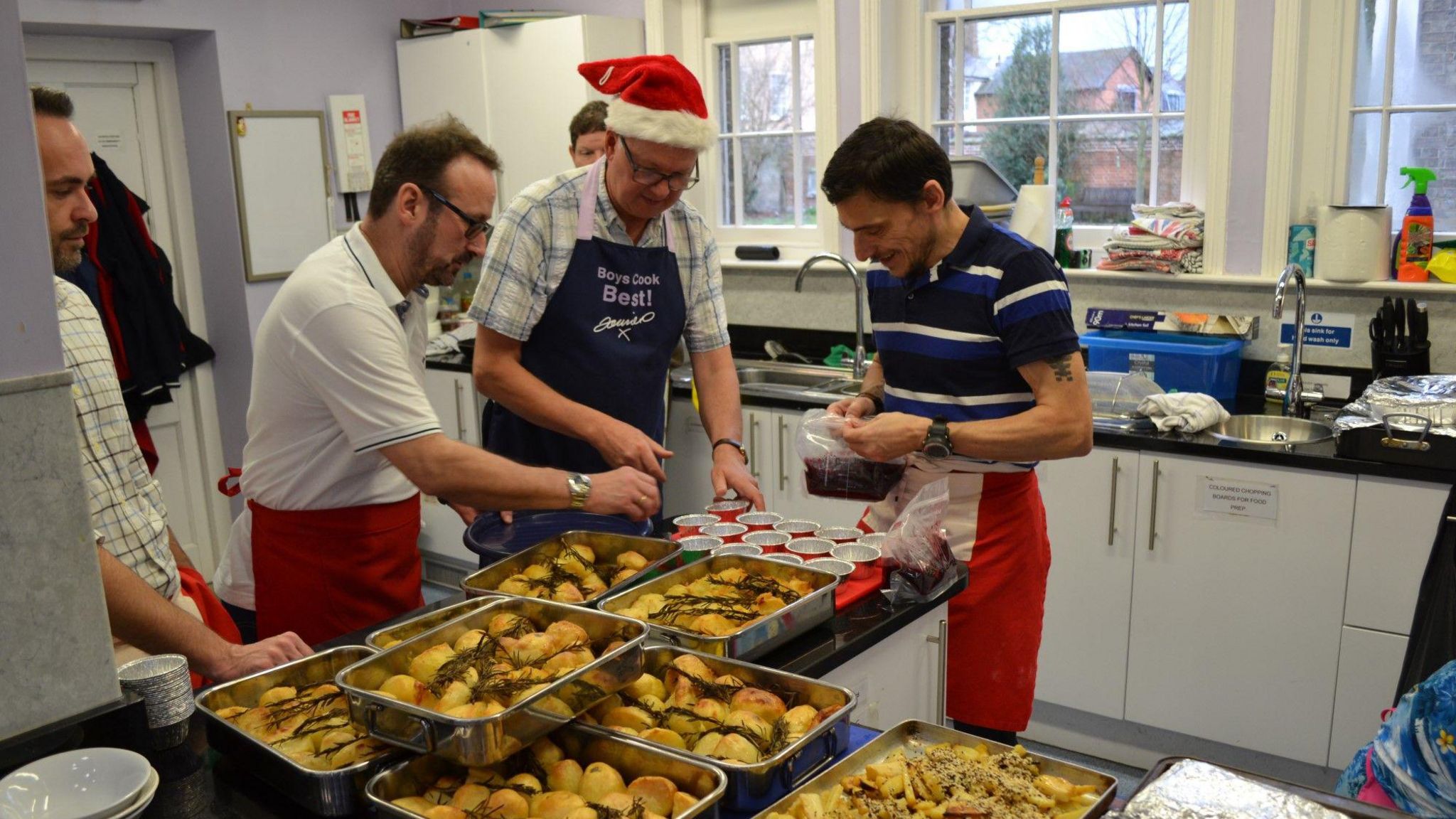 Volunteers help with the cooking during a previous Hadleigh Christmas Present Trust event 