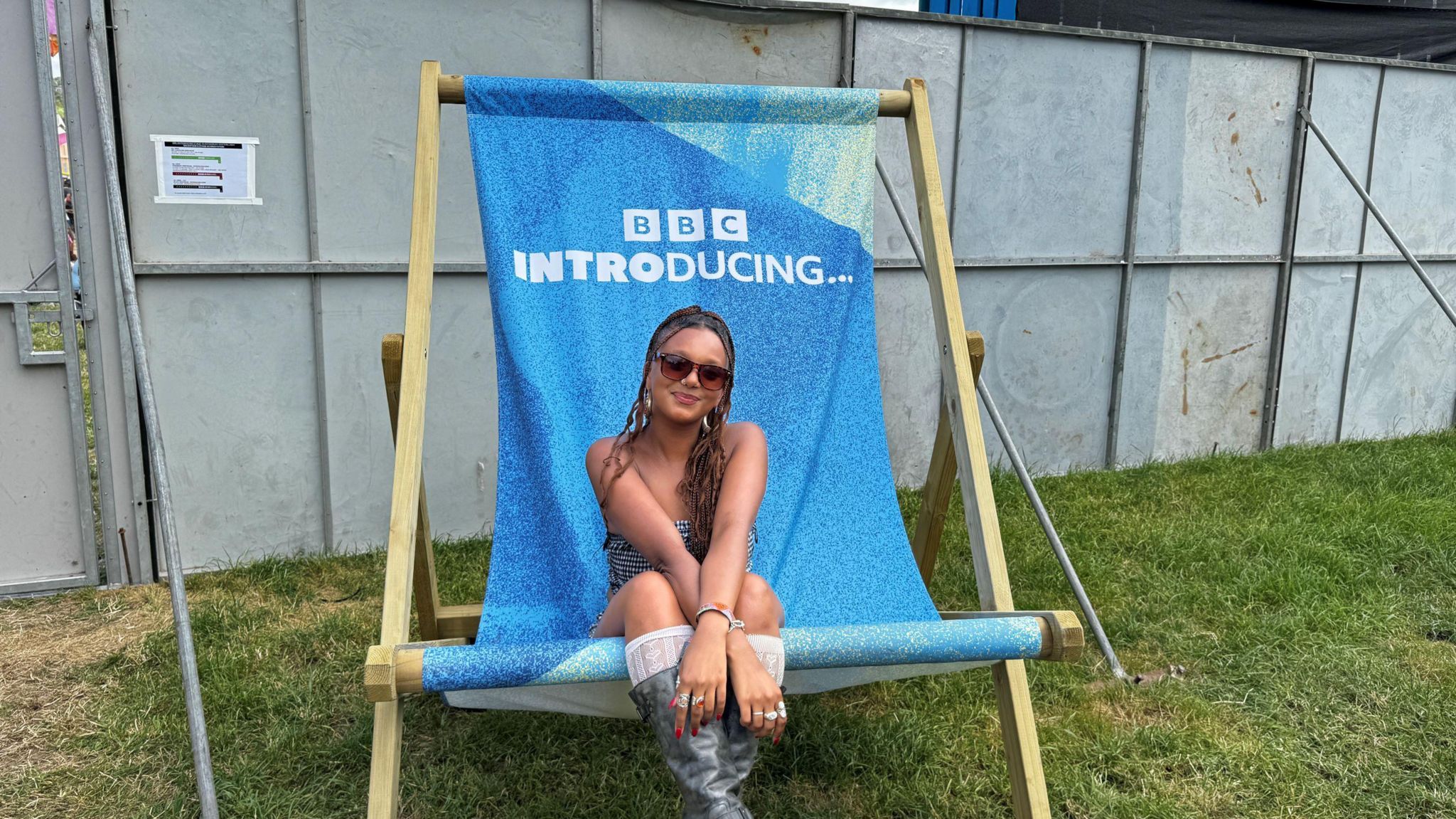 Tianna sitting in a blue BBC Introducing deck chair
