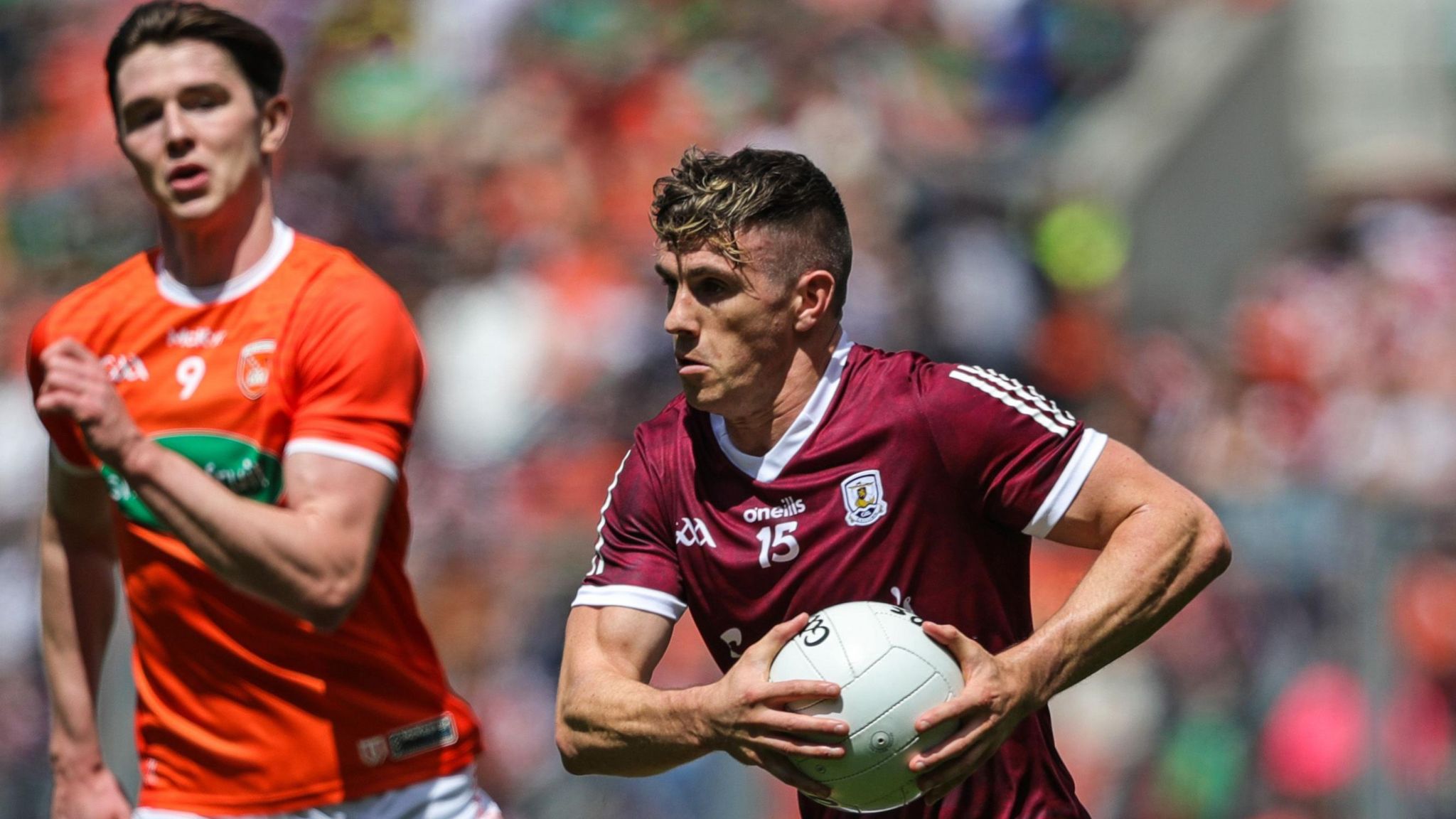 Shane Walsh attempts to speed away from Armagh's Ben Crealey in the 2022 All-Ireland Football quarter-final