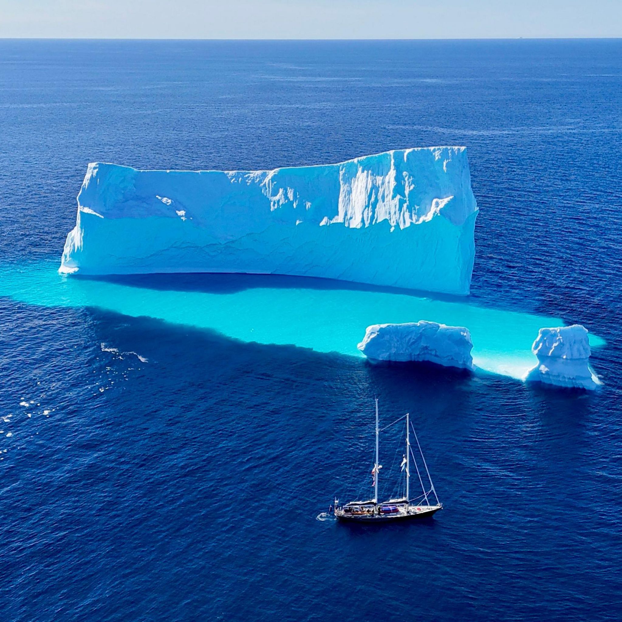 The Abel Tasman navigating around an iceberg in Disko Bay, near Greenland.