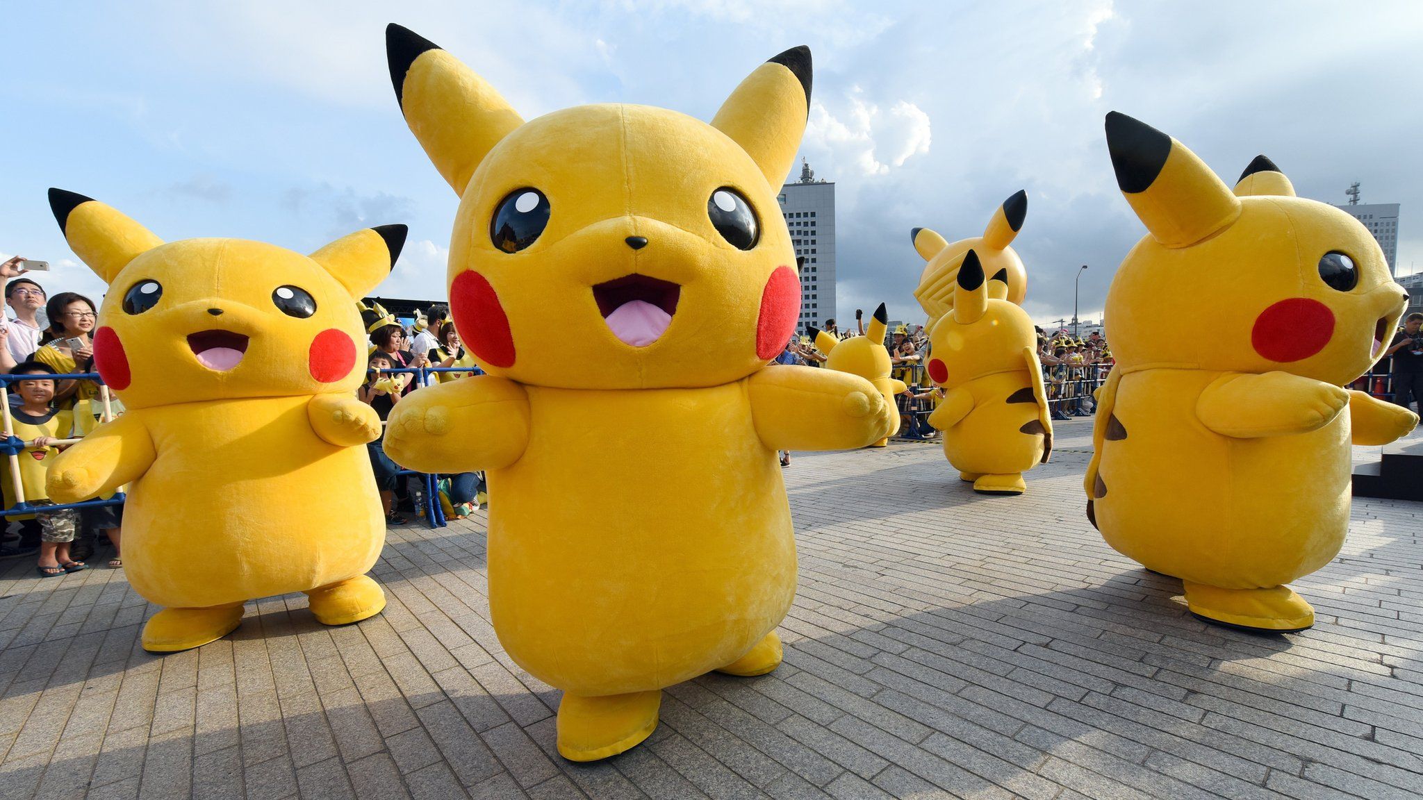 Dozens of people dressed up as Pikachu, the famous character of Nintendo's videogame software Pokemon