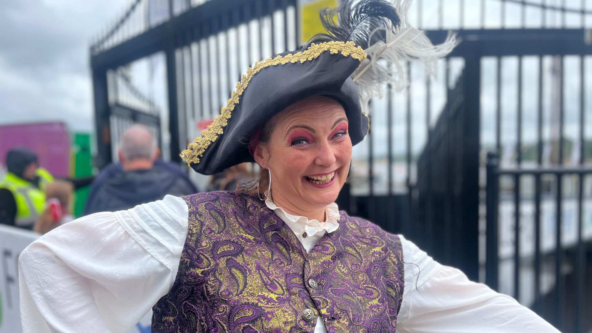 An entertainer smiling at the Foyle Maritime Festival