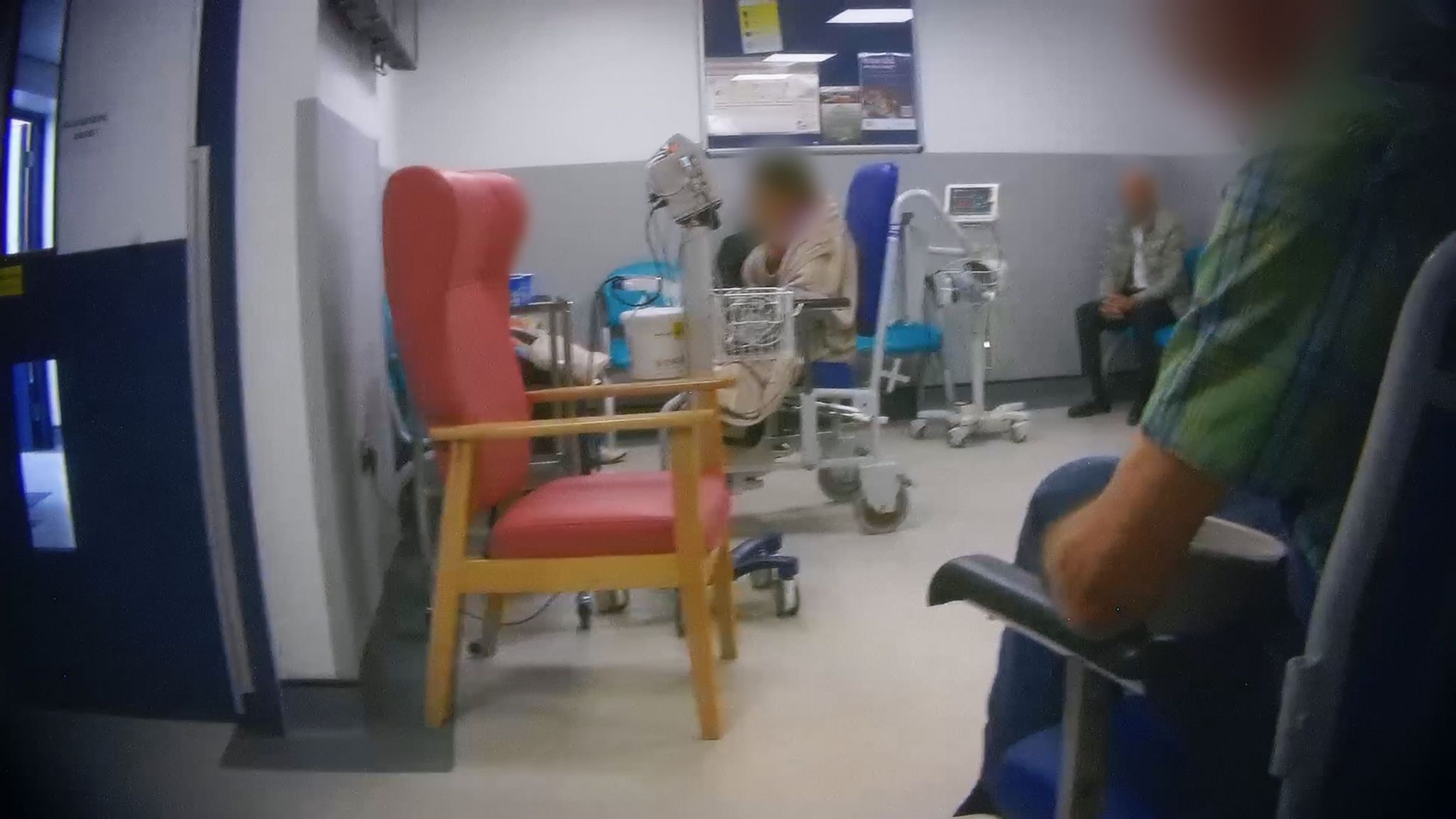 A picture of patients with their faces blurred beoing treated and waiting in corridor areas at the Royal Shrewsbury Hospital