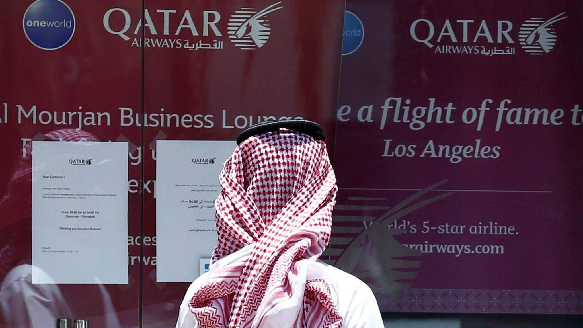 A man stands outside Qatar Airways office in Riyadh, Saudi Arabia, June 5, 2017