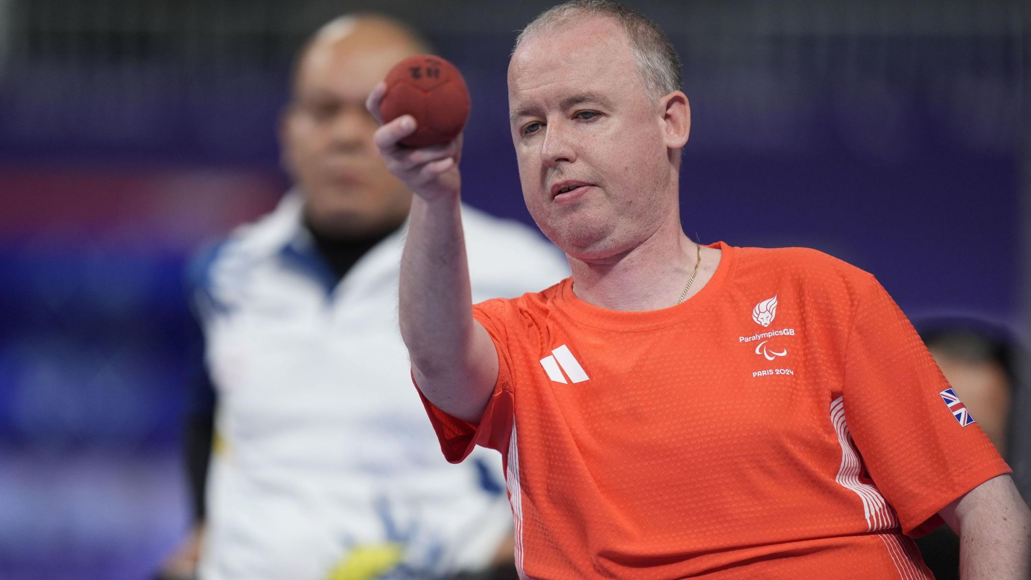 Stephen McGuire prepares to throw the boccia ball in his Paralympic Games final