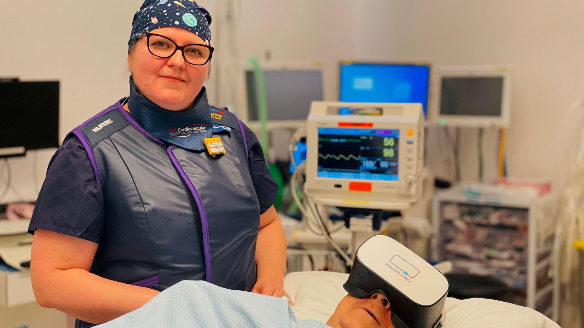 A hospital patient wearing a VR headset before undergoing a minor operation