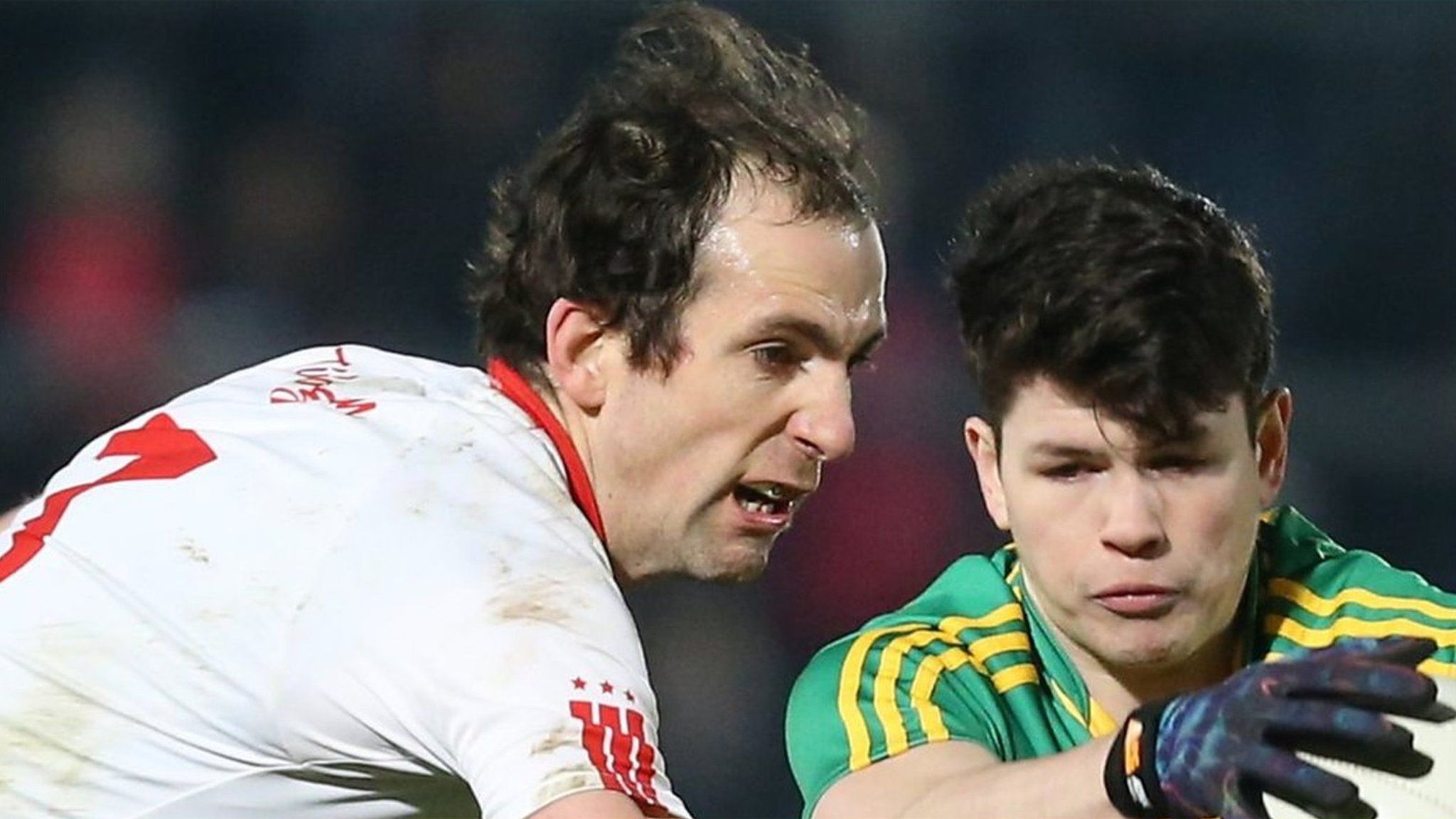 Tyrone's Justin McMahon battles with Donegal youngster Colm Kelly in the McKenna Cup game at Omagh on Wednesday night