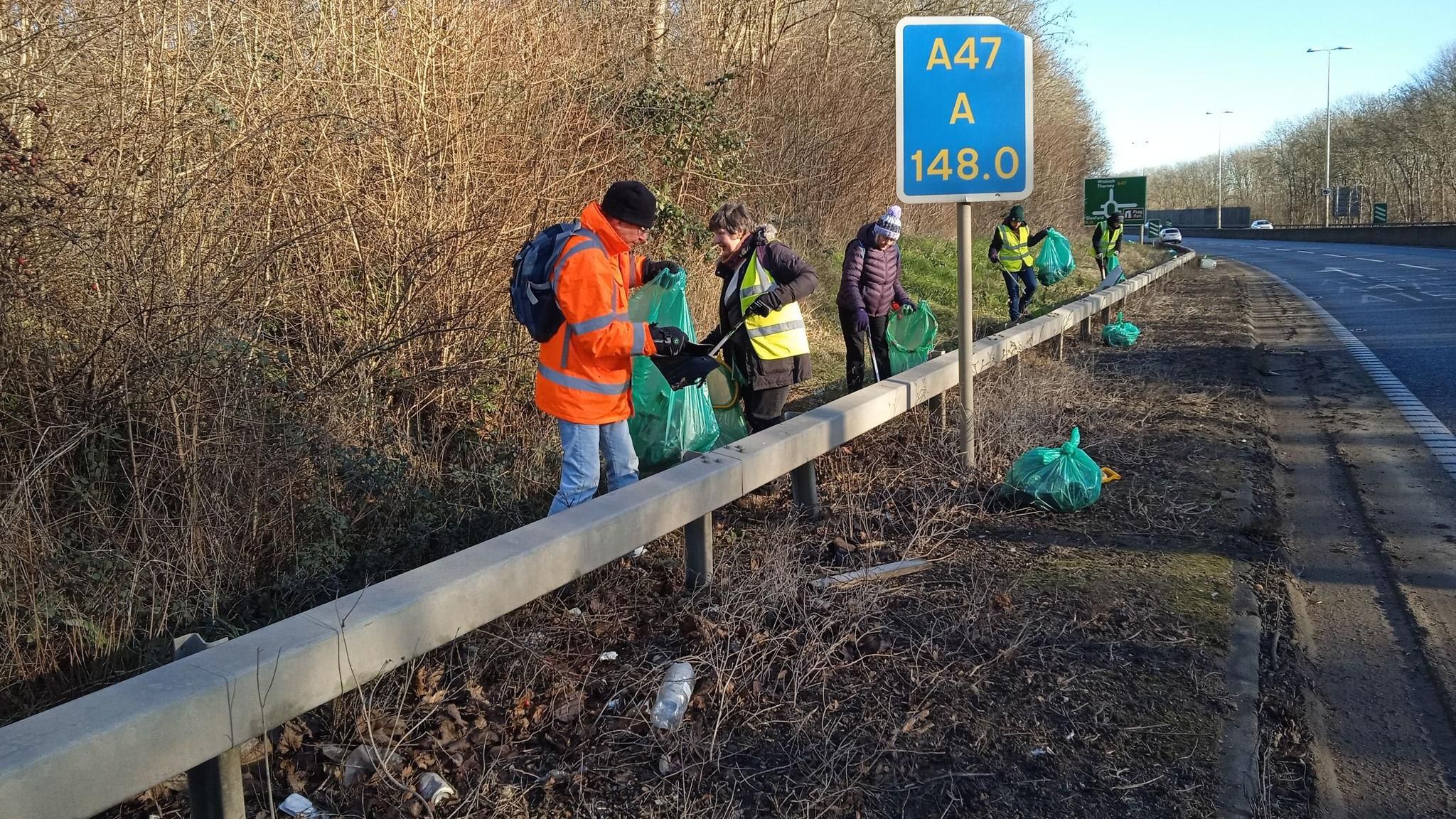 Litter pickers along the A47