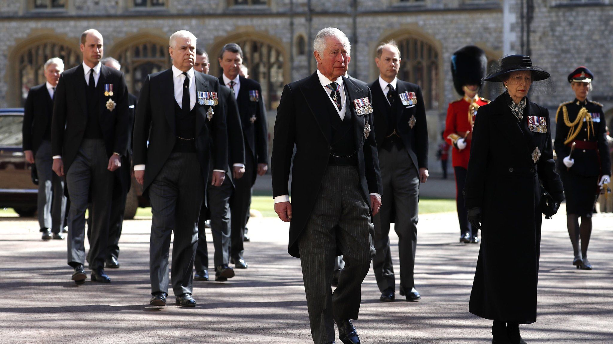 Senior royals walk behind Prince Philip's coffin
