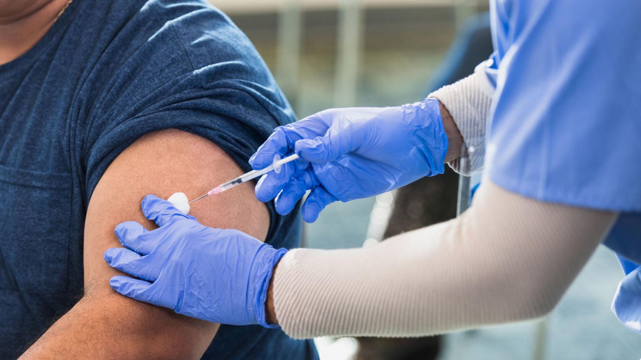 A man being vaccinated