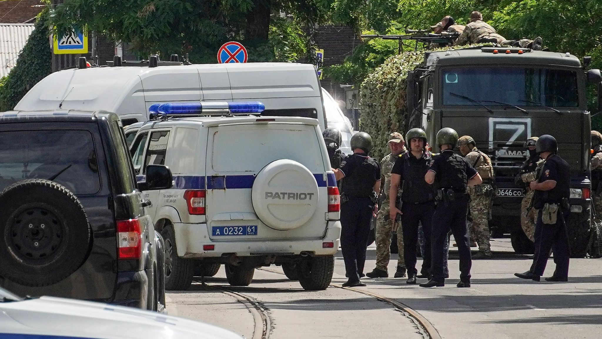 Russian police officers stand guard near a pretrial detention cente