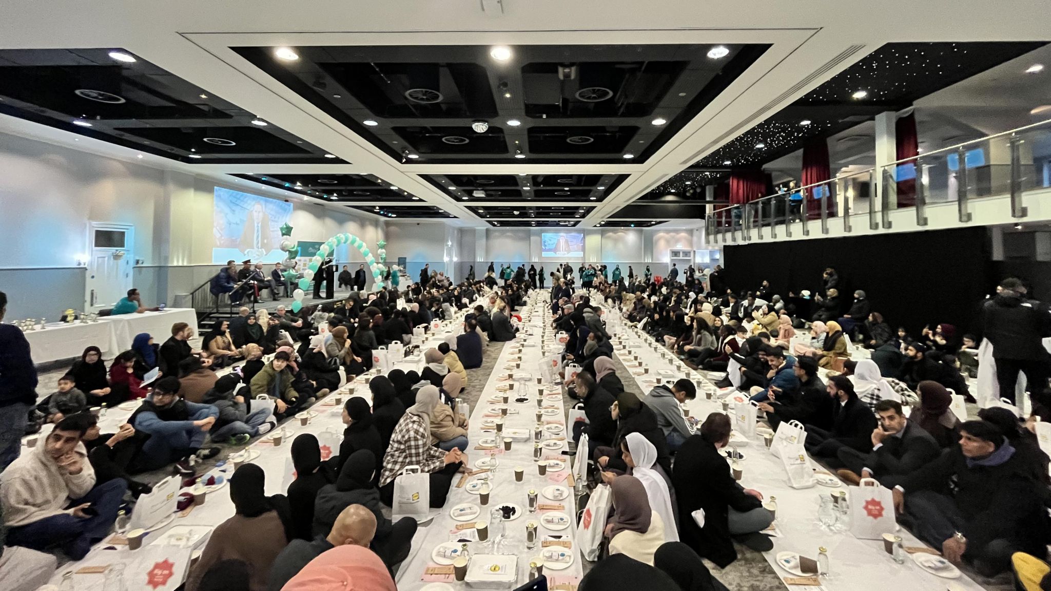 People gathering for the Open Iftar event
