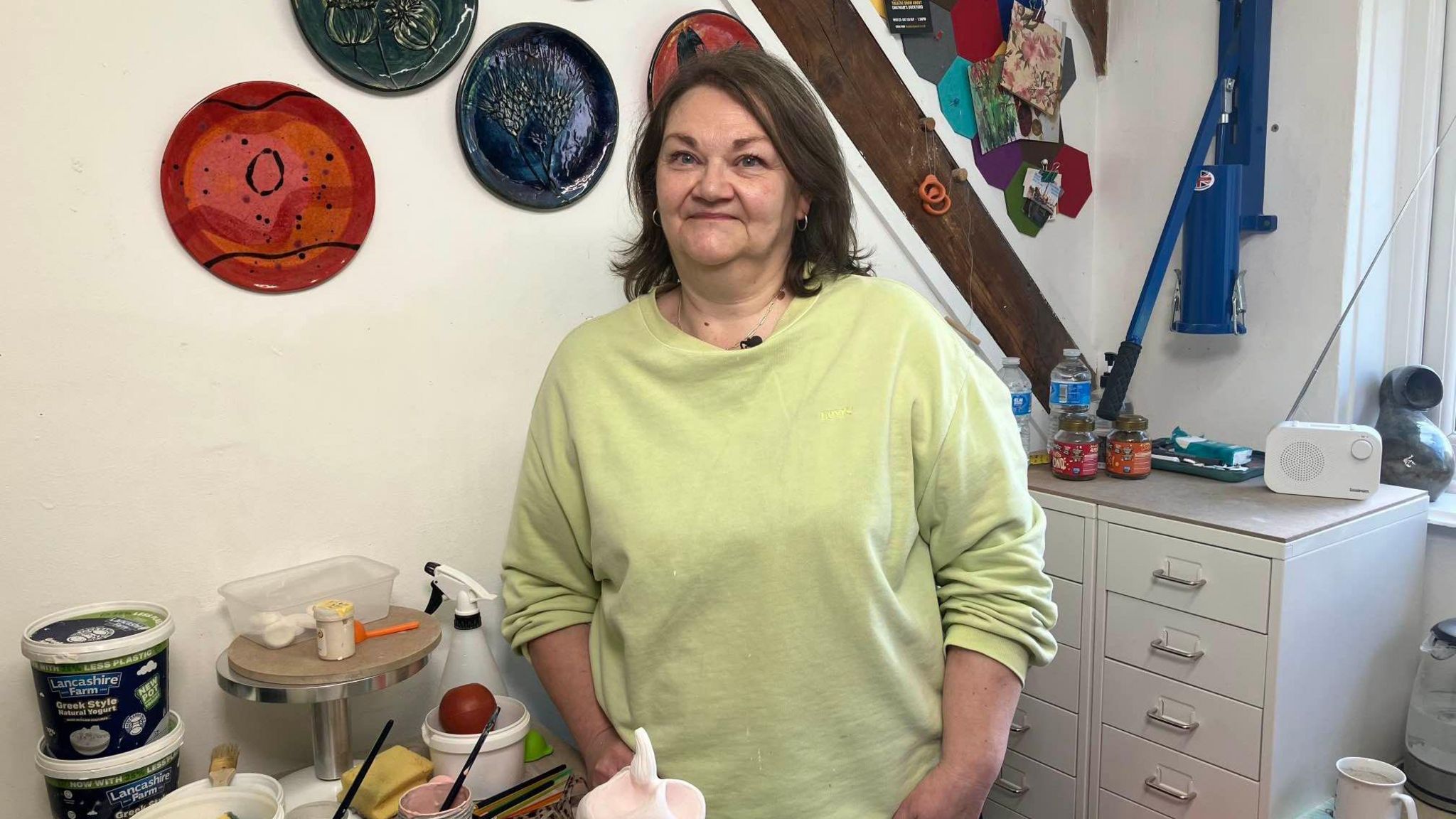 Carol Smith working with pottery