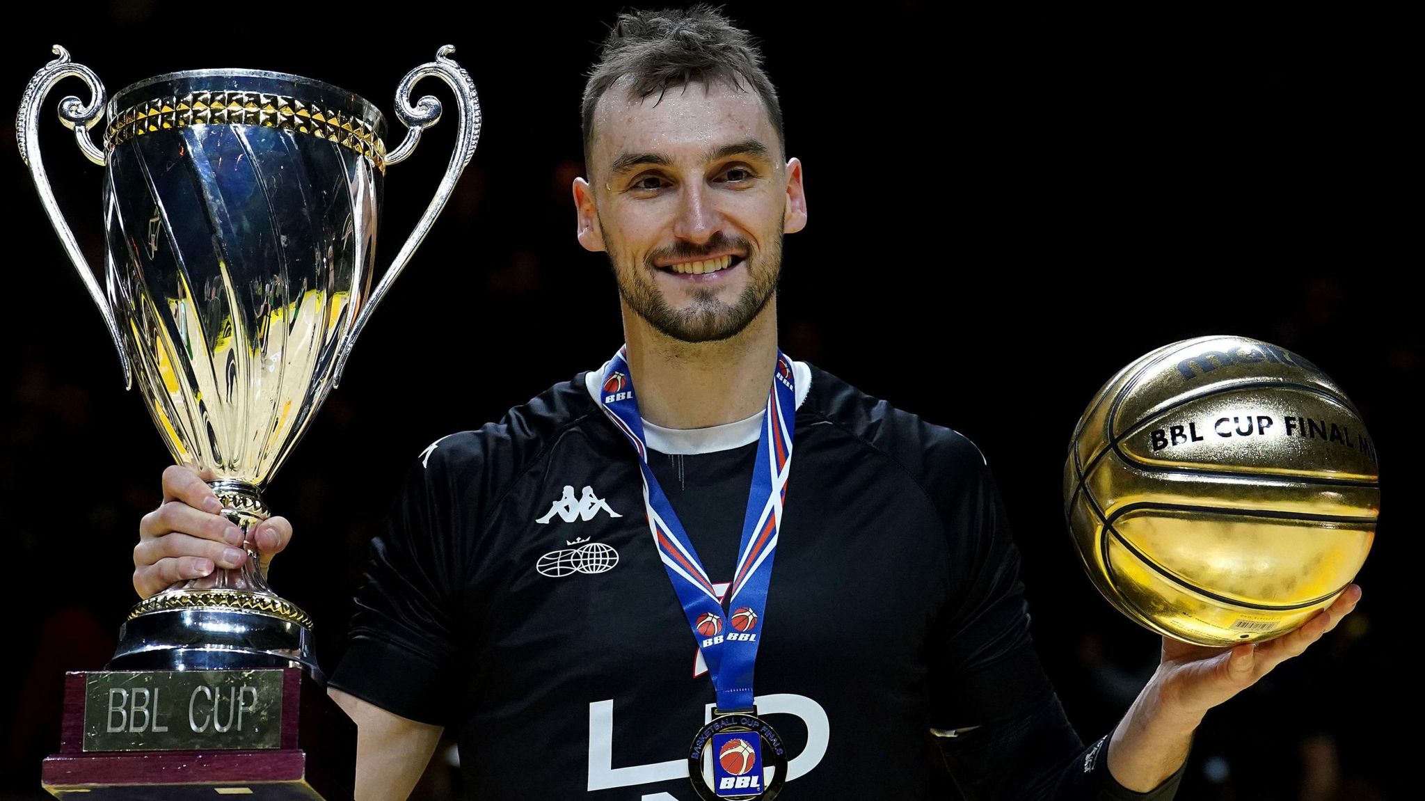 Sam Dekker poses with the BBL Cup and his player of the match award