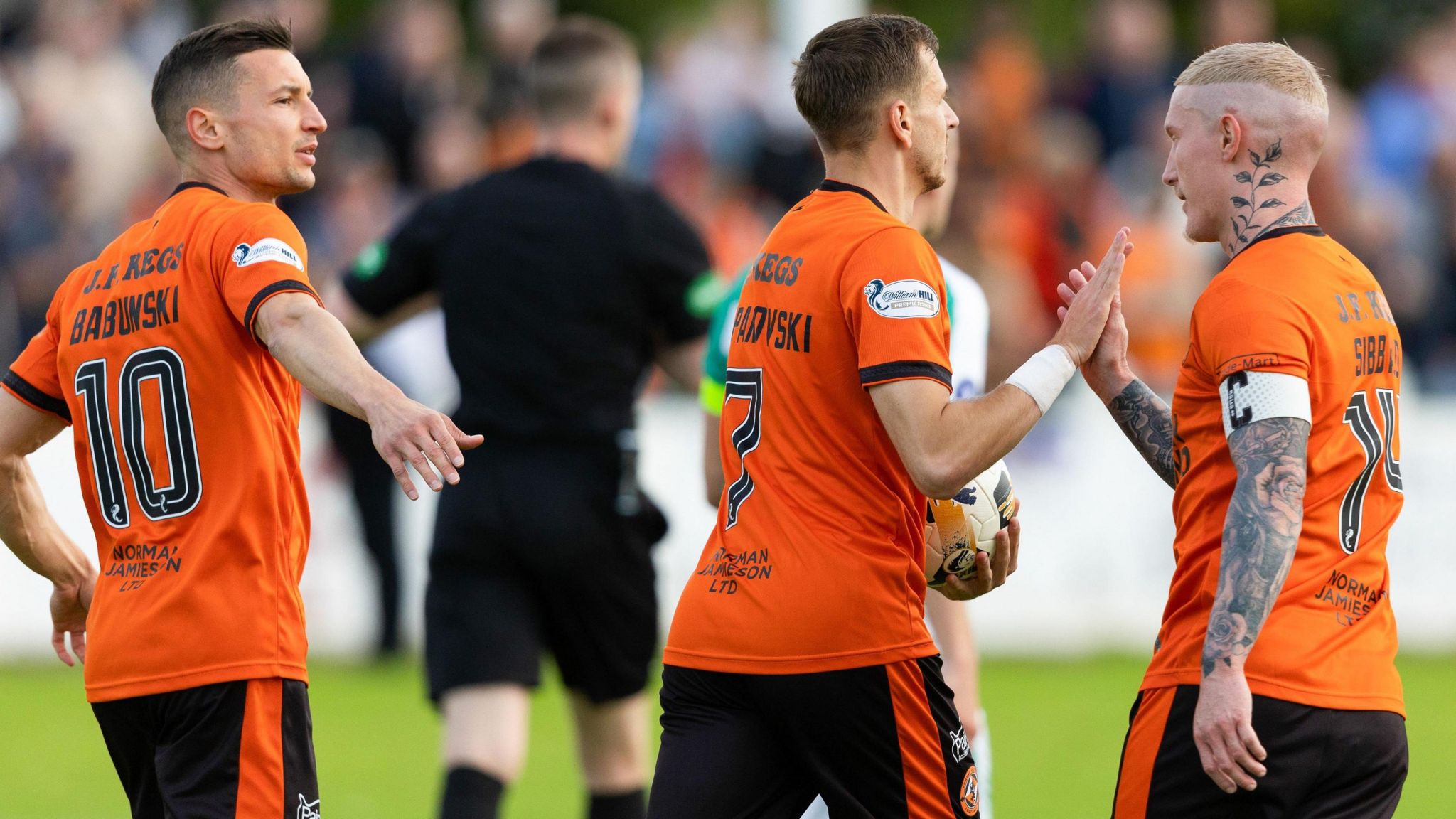 David Babunski, Kristijan Trapanovski and Craig Sibbald celebrate