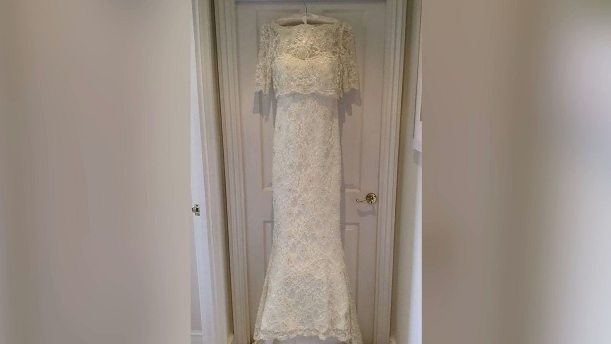 Still of a wedding dress hanging up