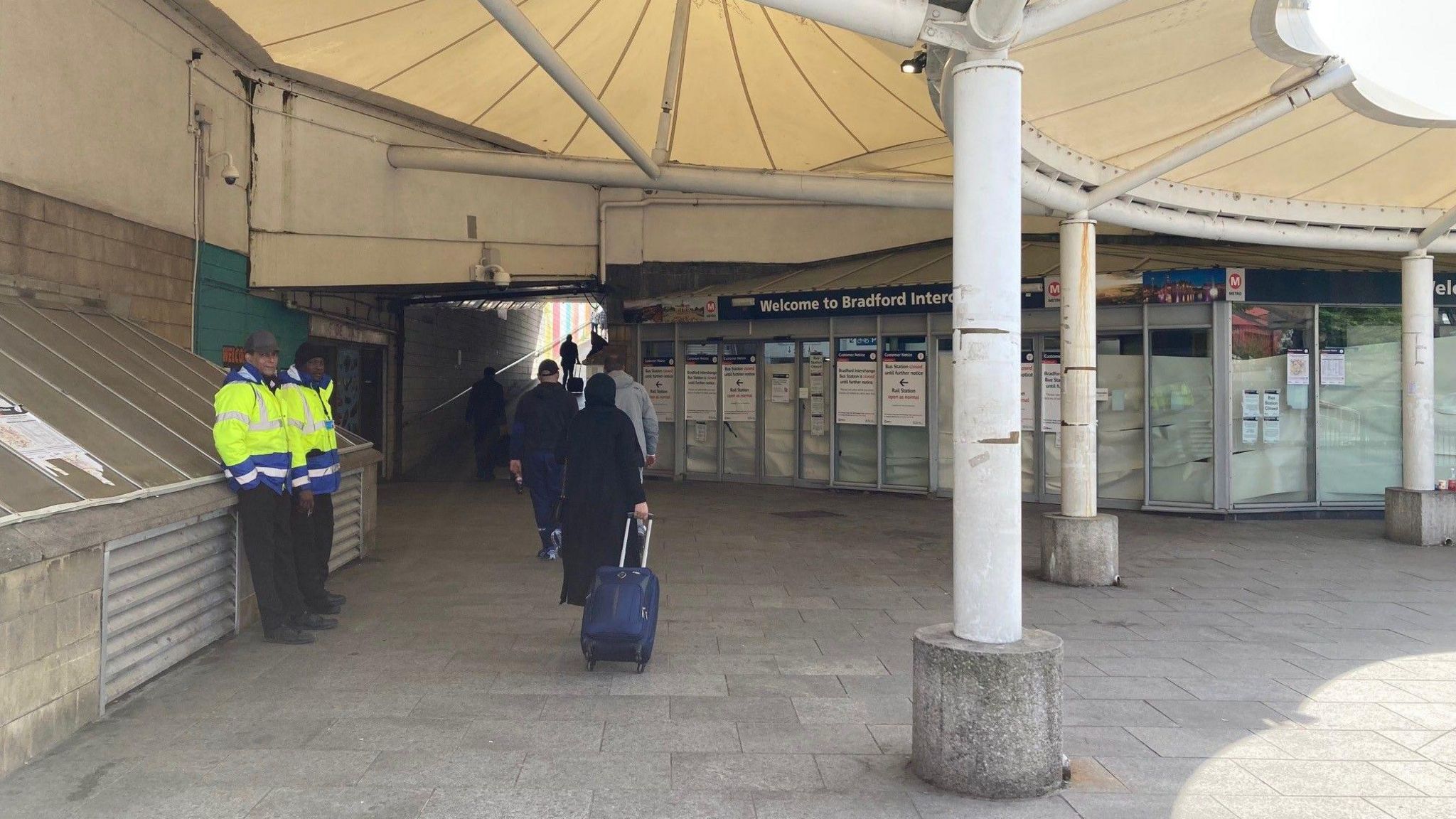 Security guards outside the Bradford Interchange