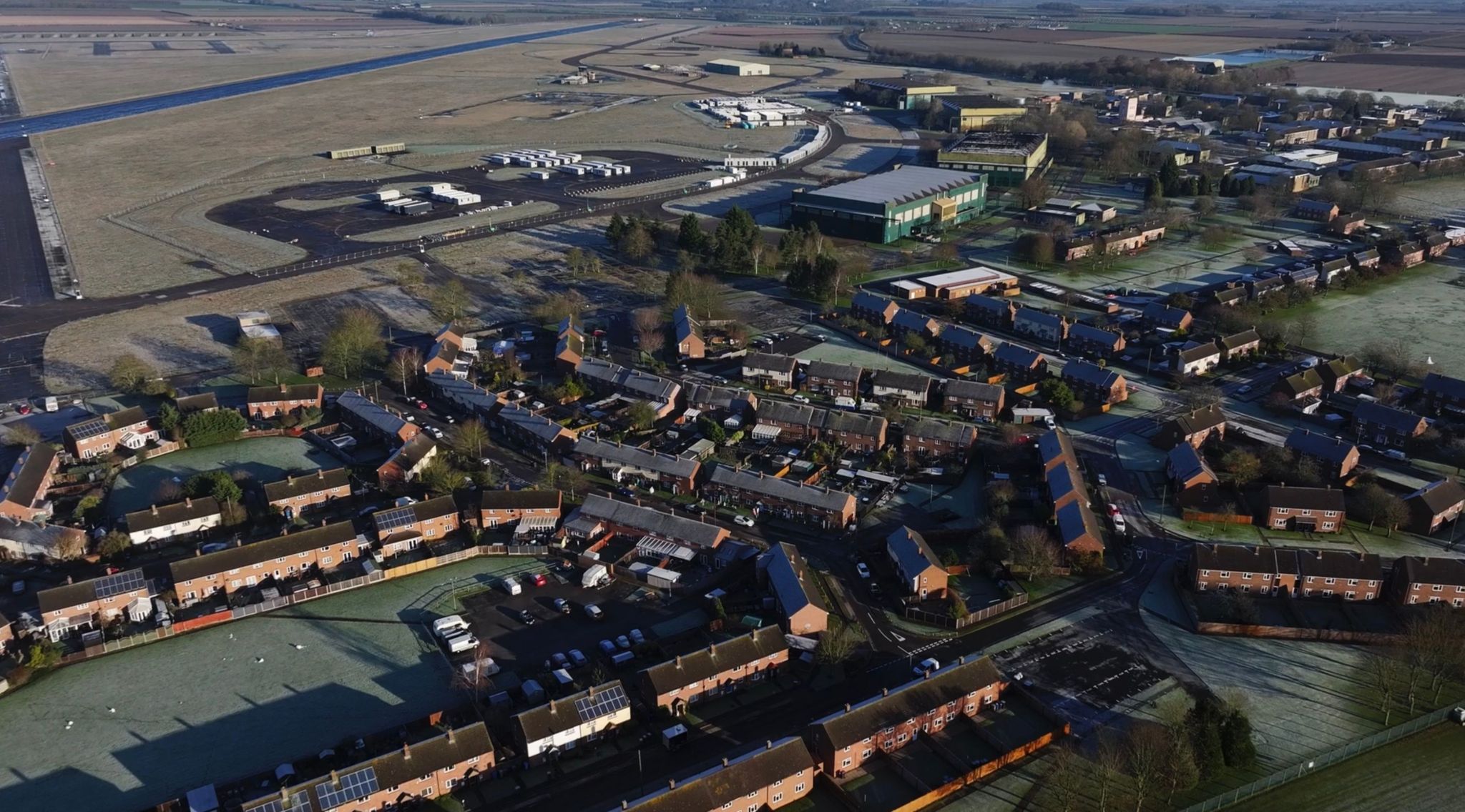 A drone view of the former RAF Scampton and the housing estate next door.