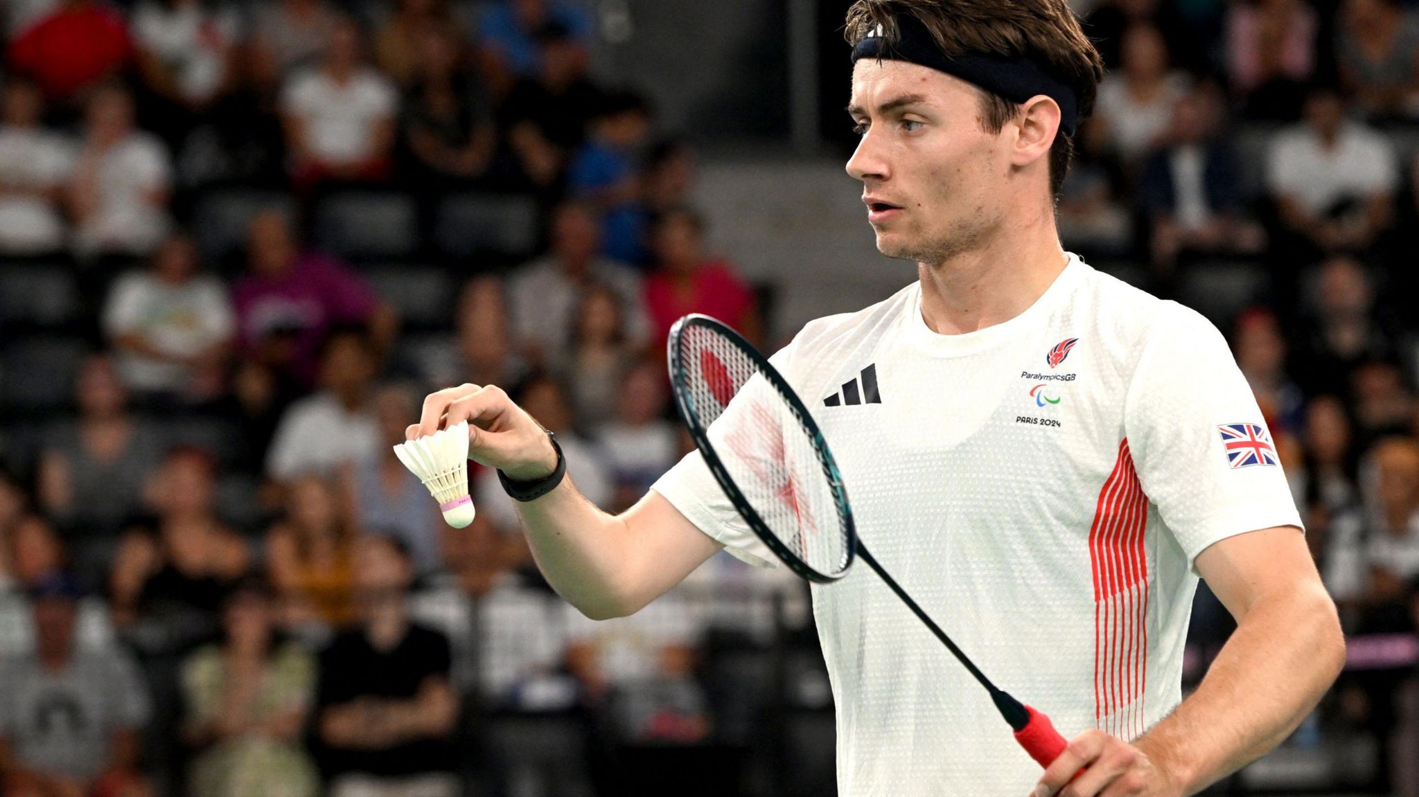 Dan Bethell plays badminton at the Paralympics in Paris