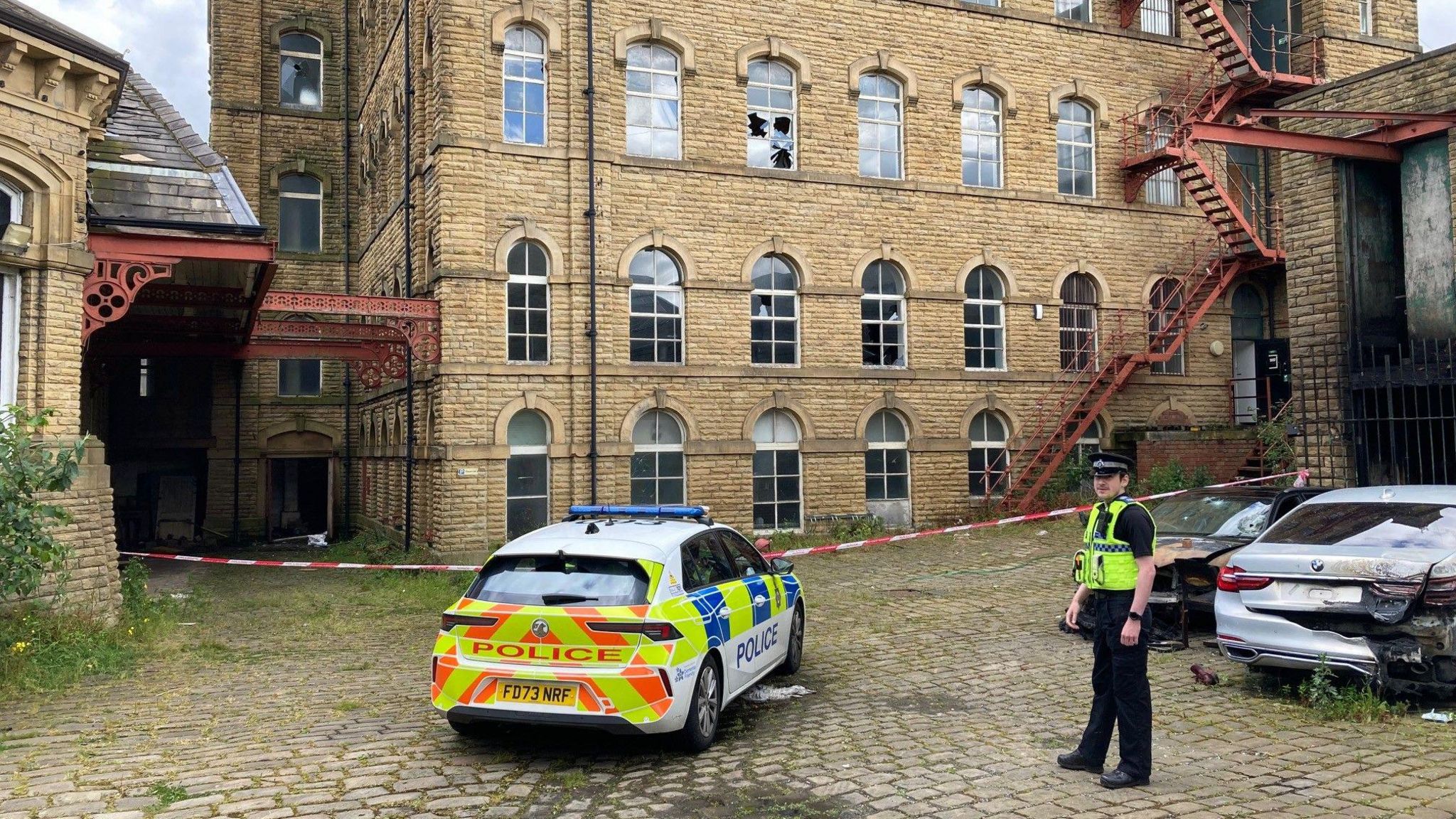 A police cordon on the Dalton Mills site after an arson attack