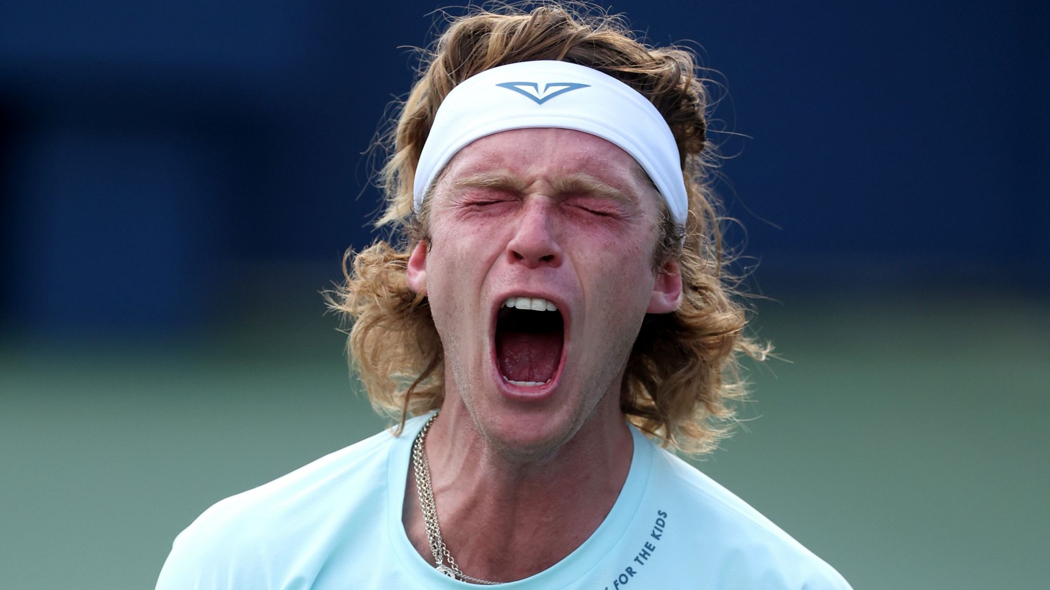 Andrey Rublev screams in celebration