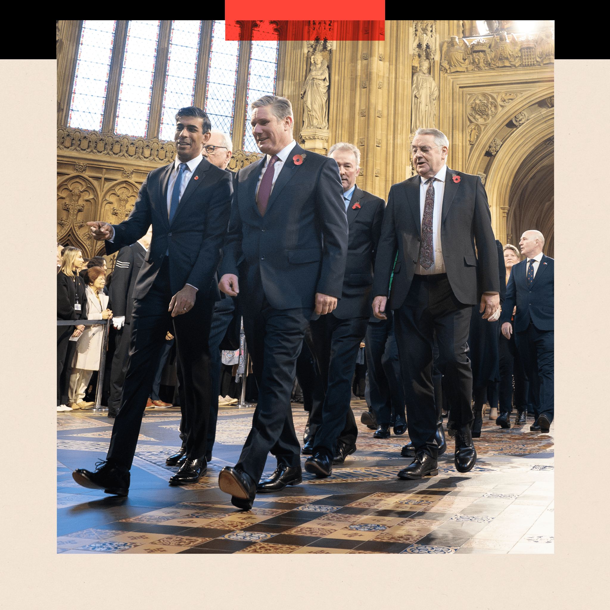 Then-Prime Minister Rishi Sunak and Labour leader Sir Keir Starmer lead MPs through the Central Lobby at the Palace of Westminster ahead of the State Opening of Parliament in November 2023