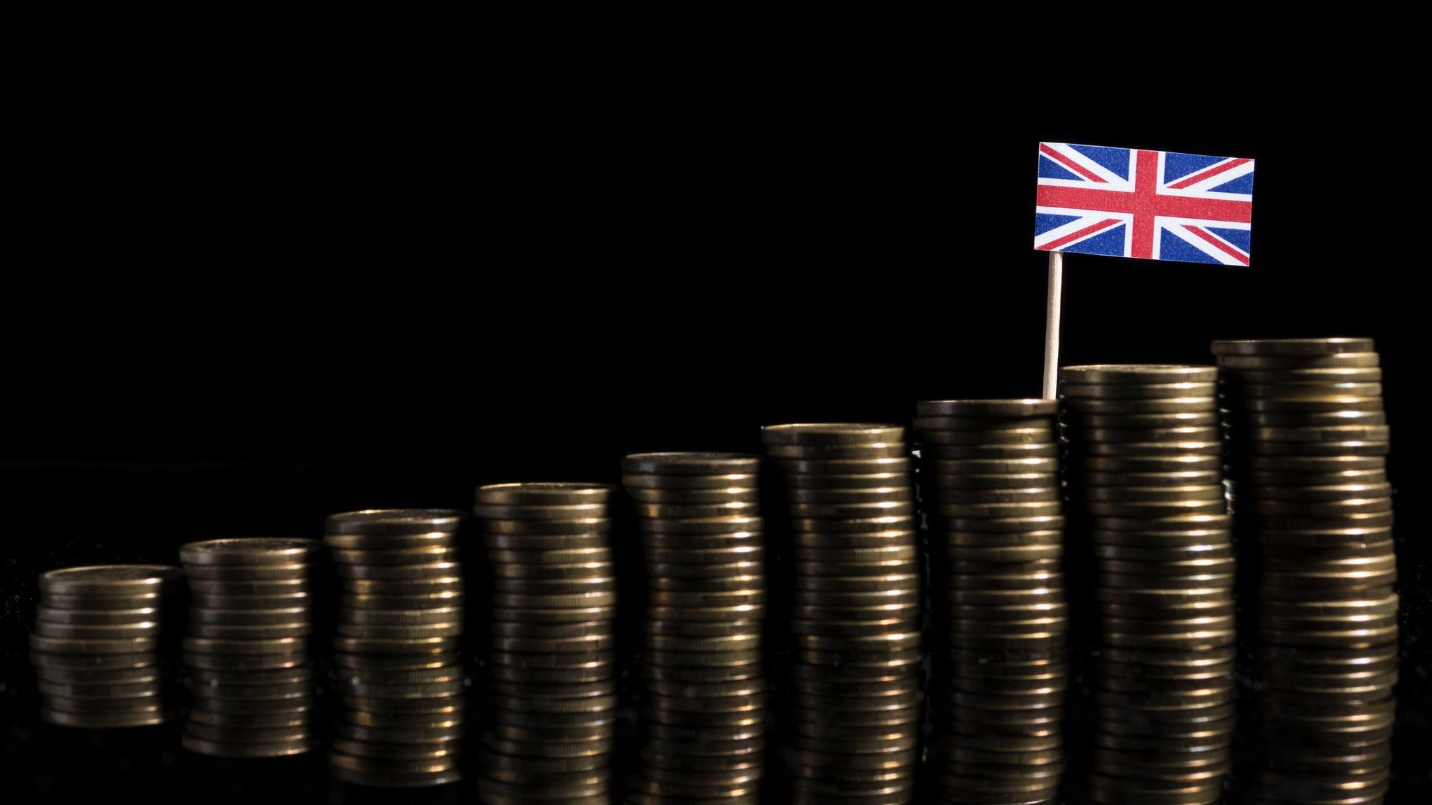 Union Flag on top of coins