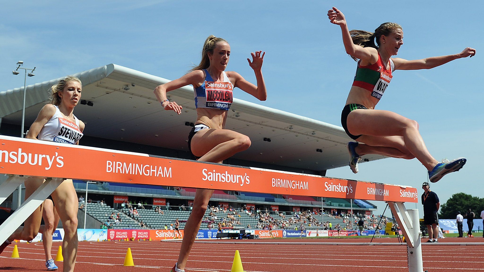 Eilish McColgan competing in a steeplechase event