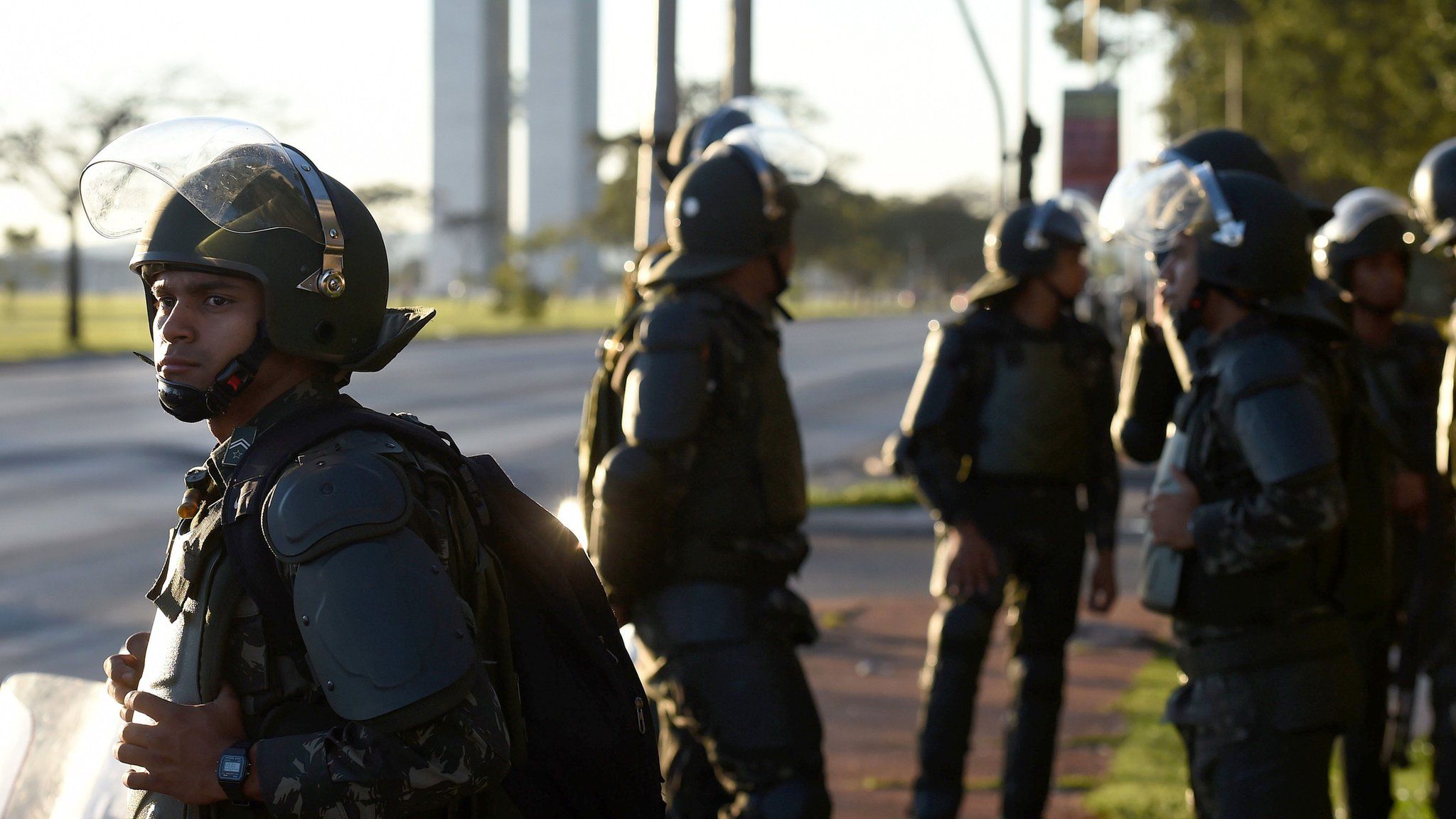 Brazilian Army military police in riot gear guard public buildings in Brasilia, on May 25, 2017