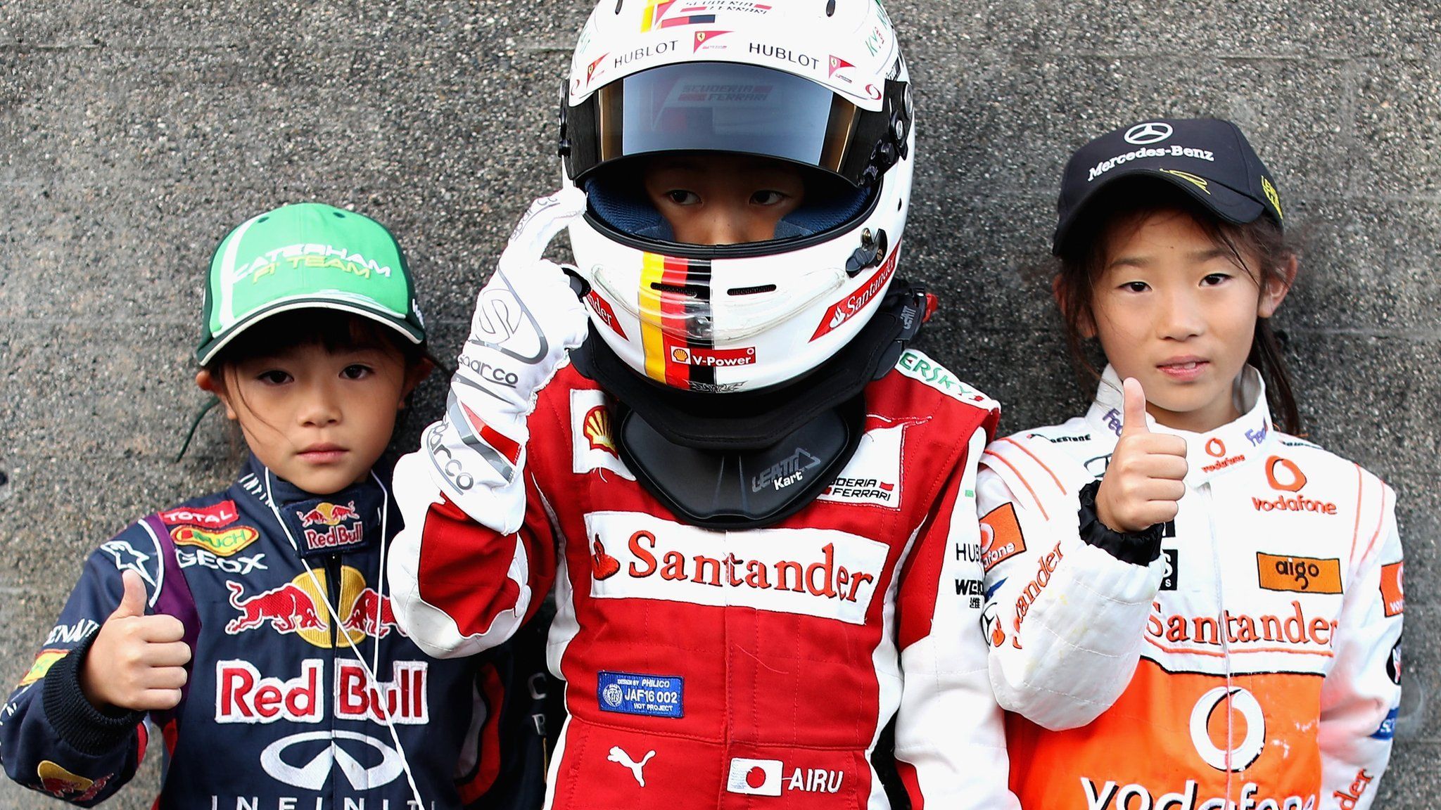Children attend the Japanese Grand Prix