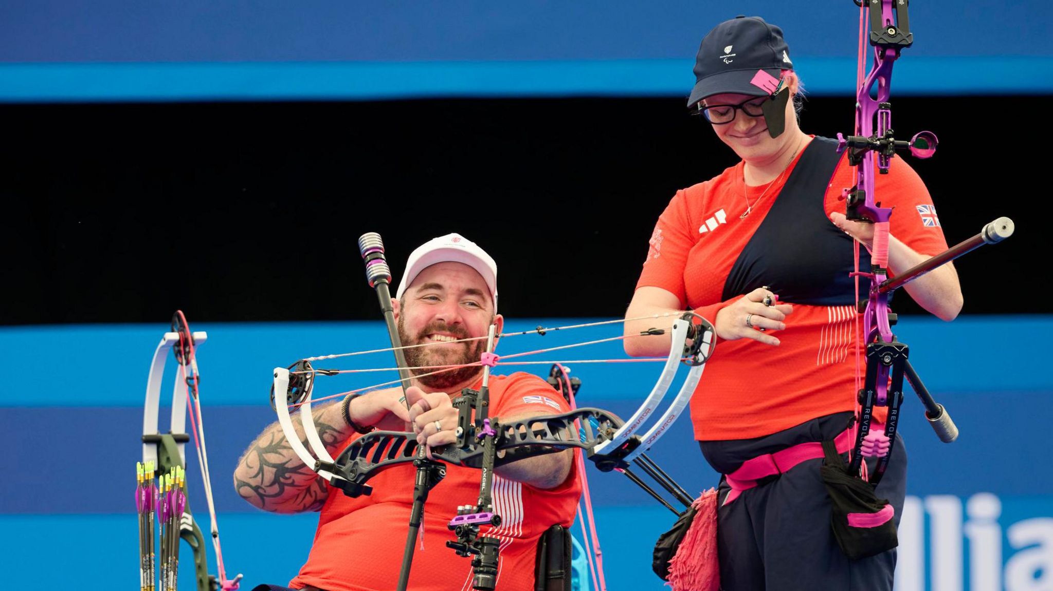 Nathan Macqueen and Jodie Grinham smile during competition