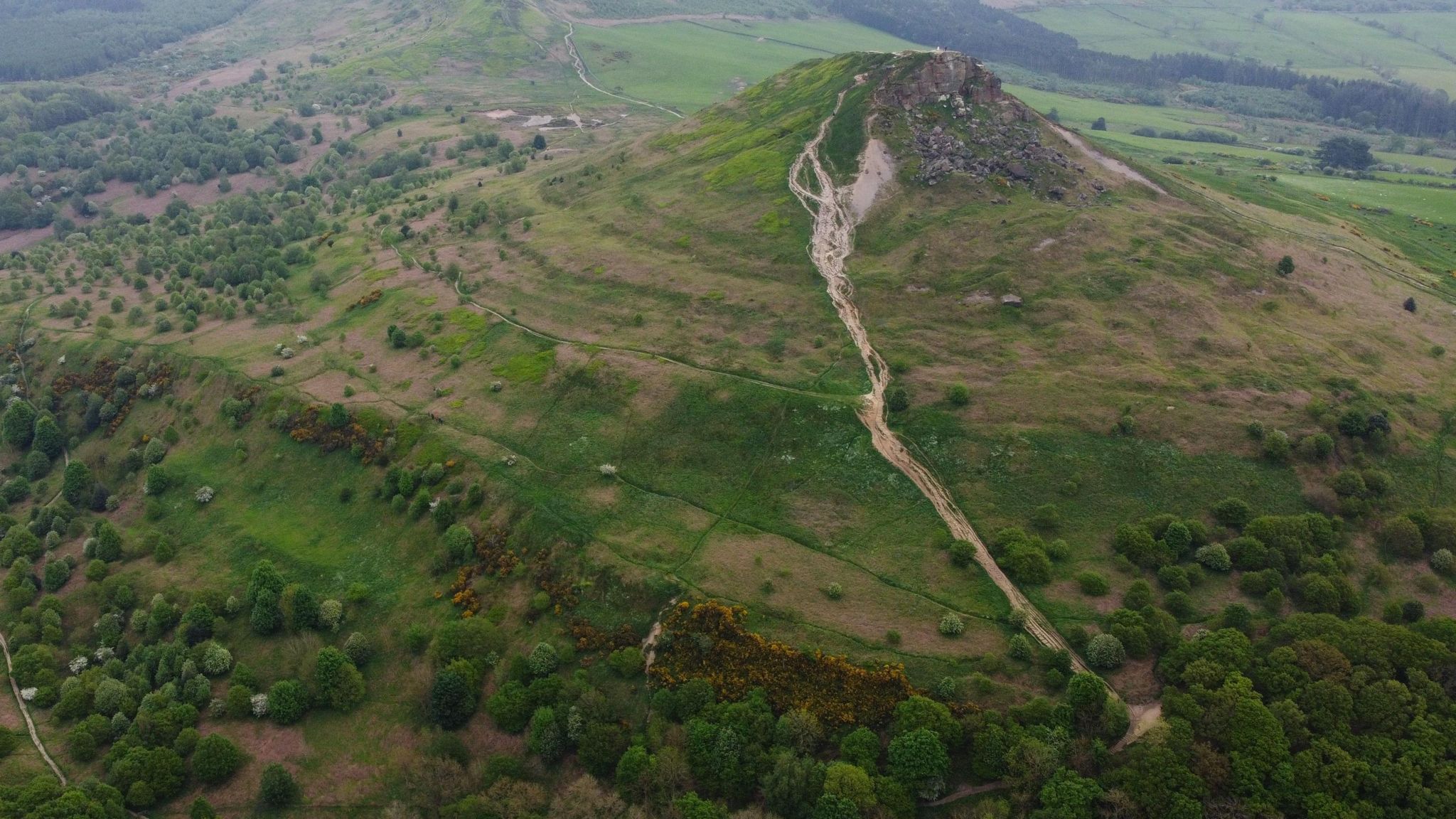 Drone shot of Roseberry Topping showing the path damage
