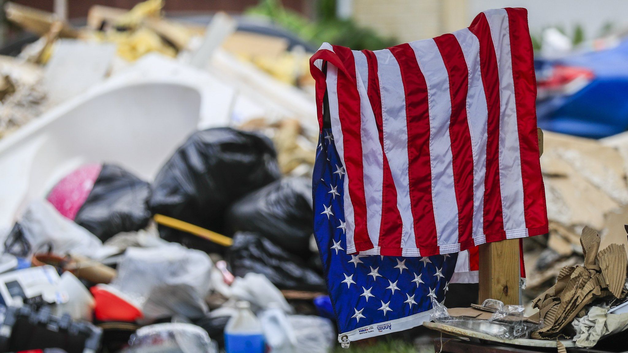 An American flag dries in the aftermath of Hurricane Harvey