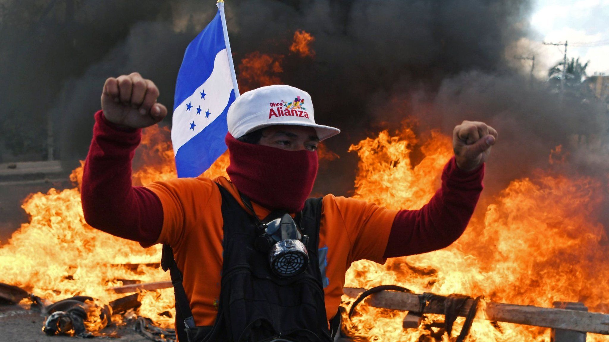 Honduran Opposition Alliance Against the Dictatorship supporter protest among barricades against president Juan Orlando Hernandez reelection, while the inauguration ceremony takes place at the Tiburcio Carias Andino national stadium, in Tegucigalpa, on January 27, 2018.