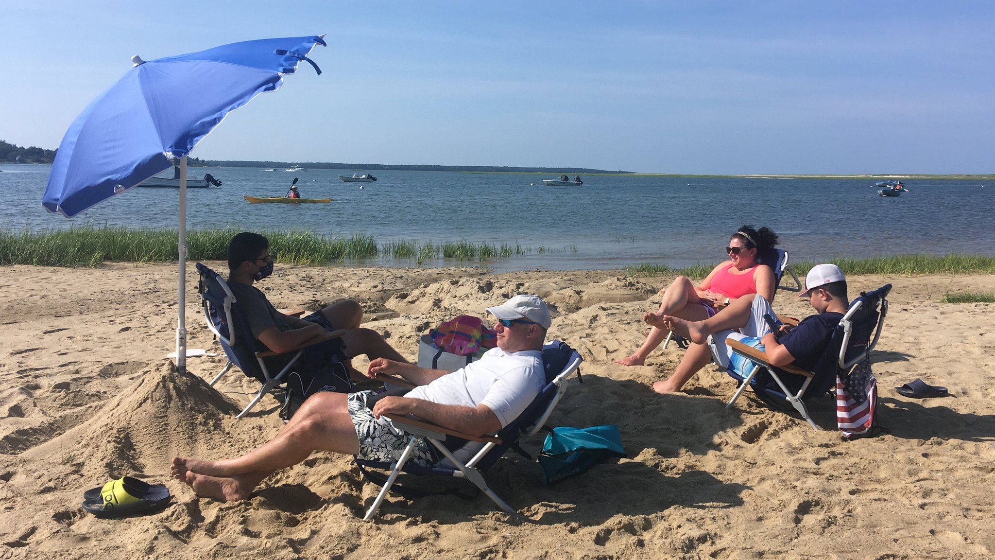 Zoe Fishman and family sunbathe on Cape Cod