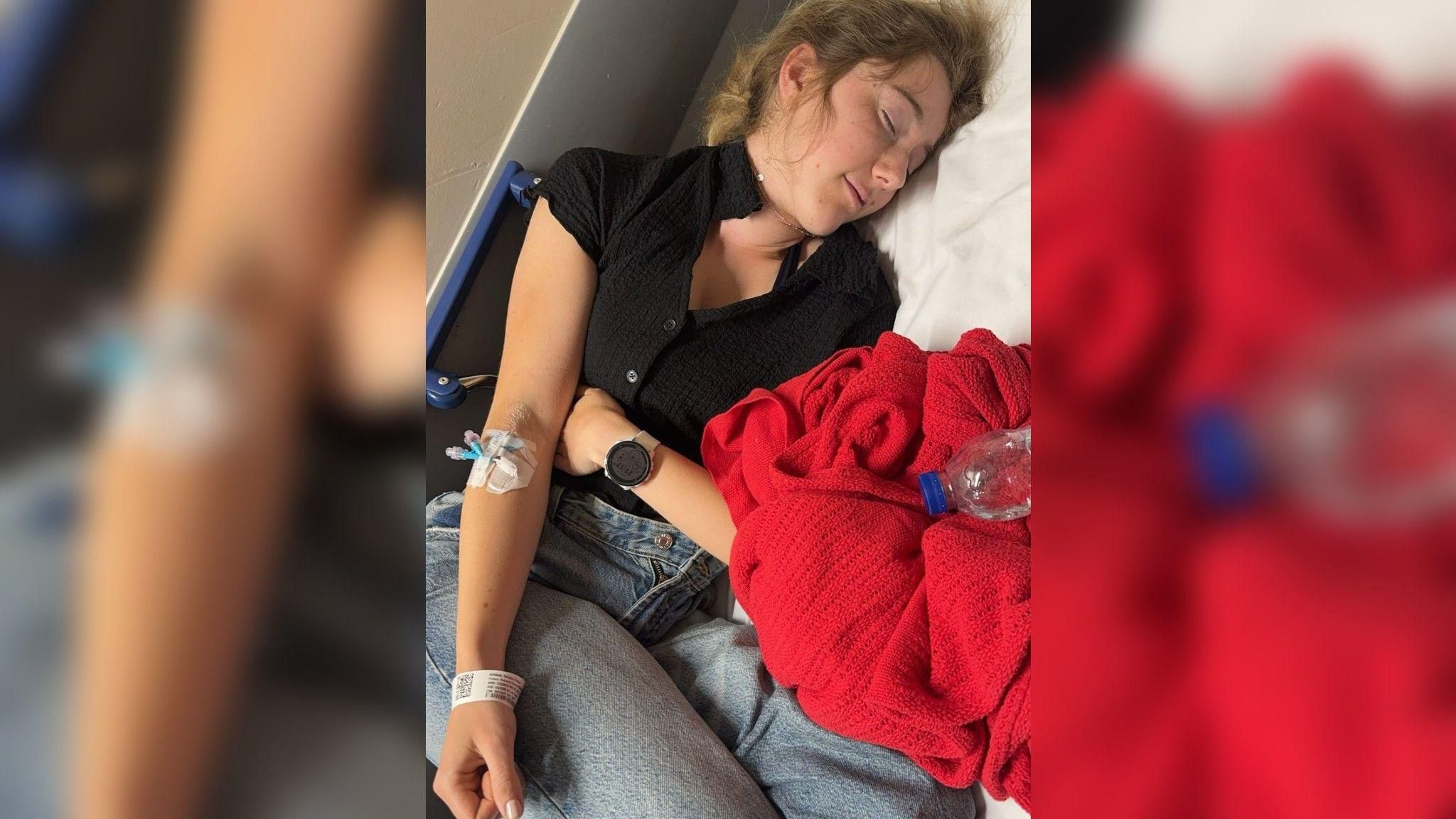 Rebecca Norman in hospital with a cannula in her arm