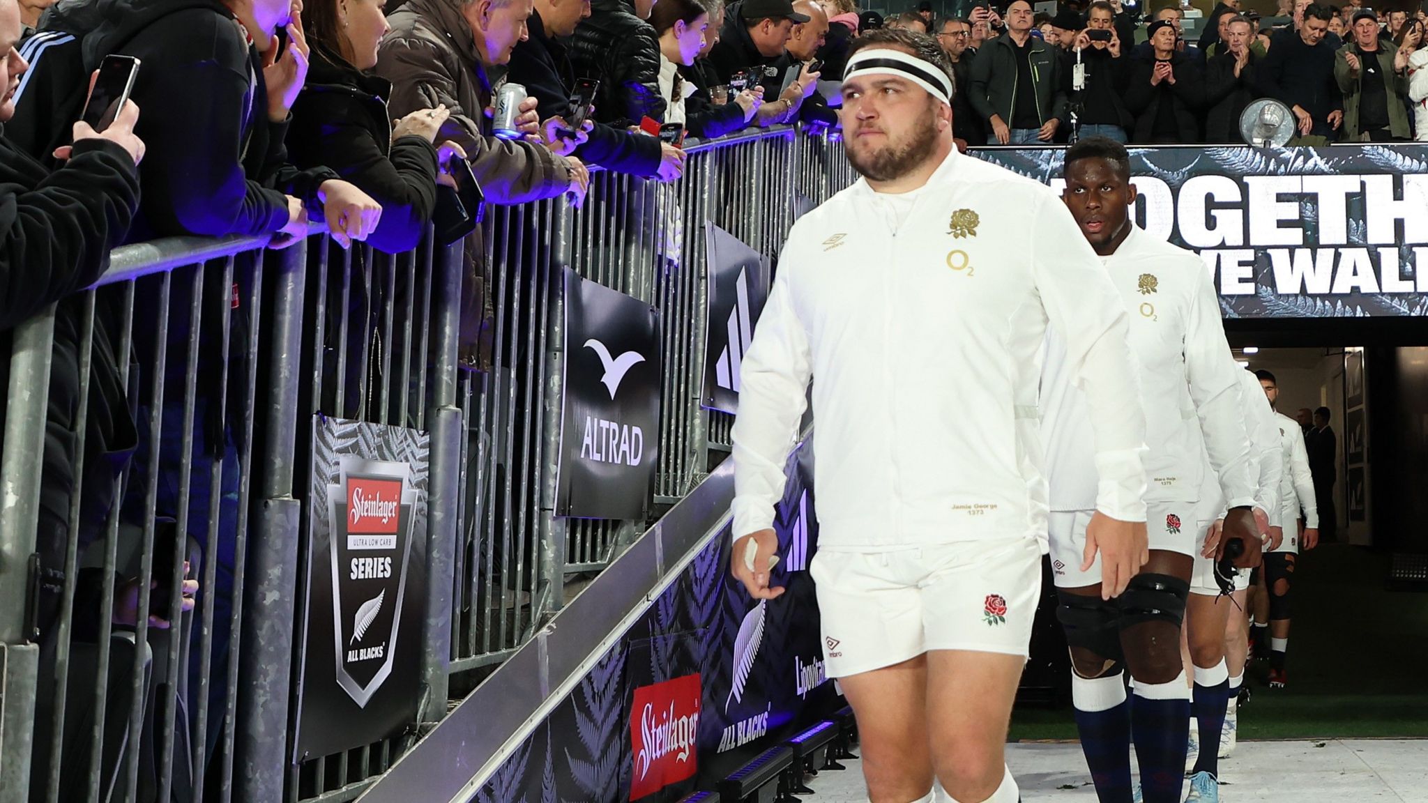 Jamie George leads out England before their match against New Zealand