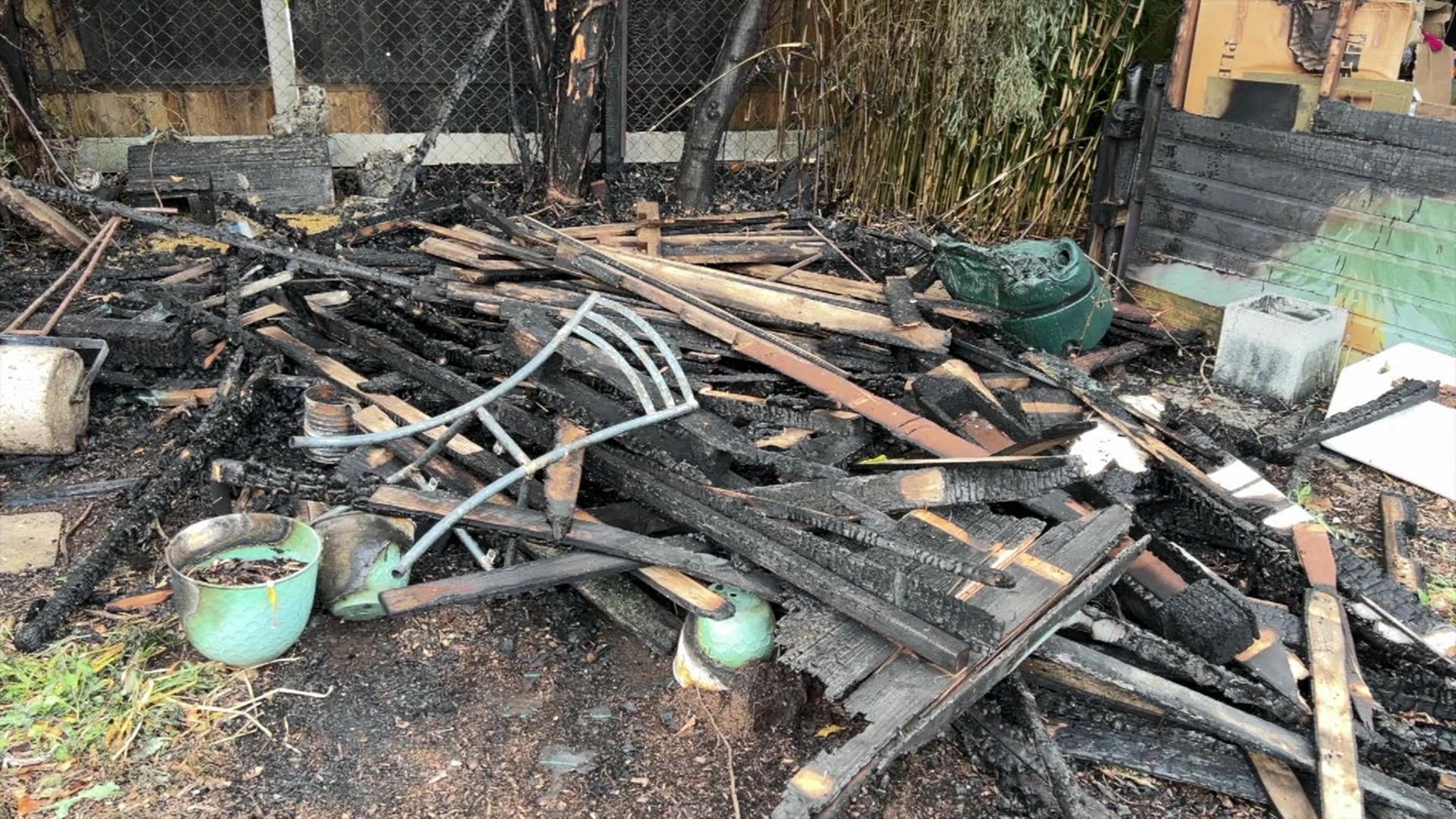 A pile of garden items which were damaged by the fire