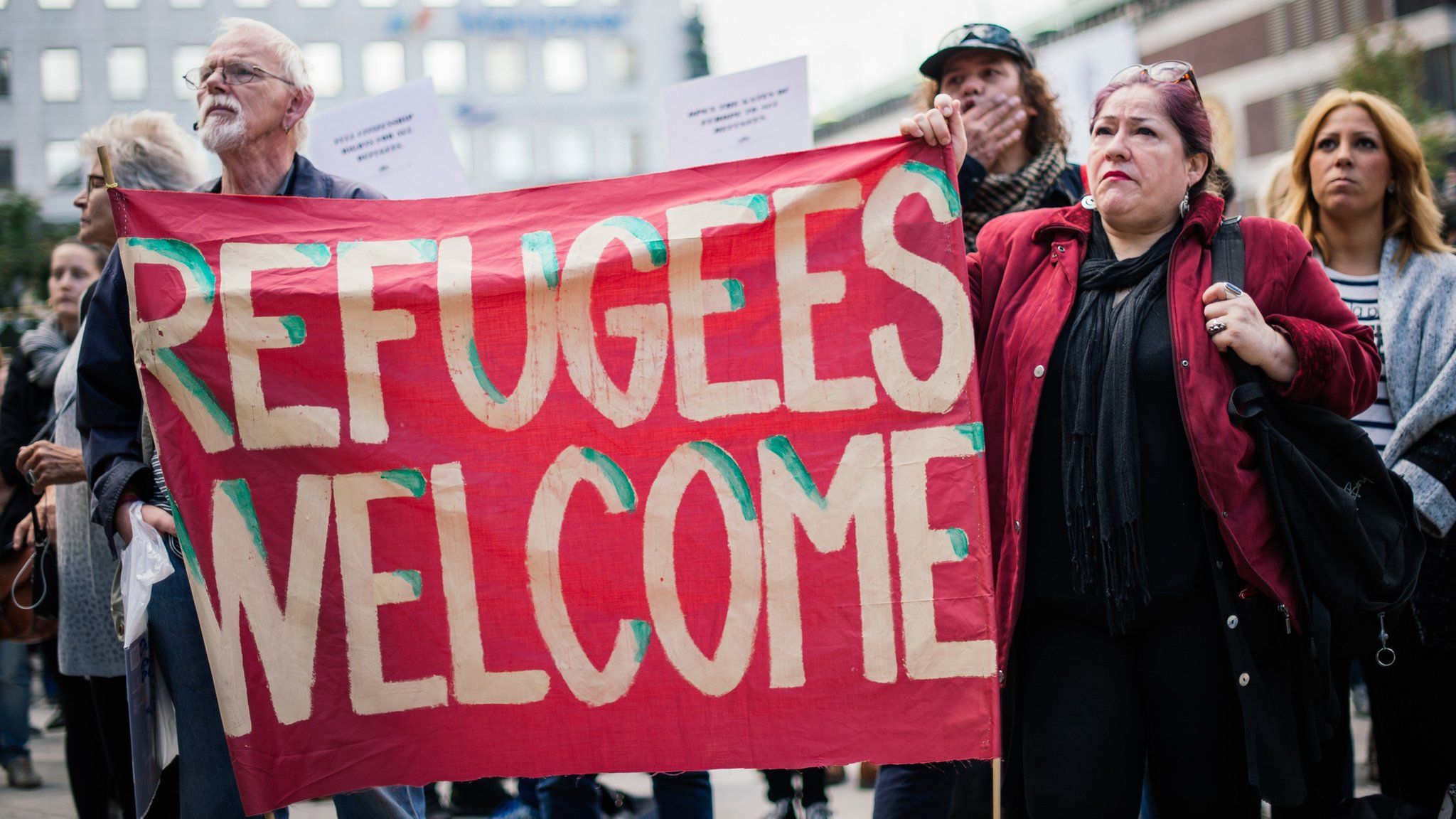 Swedish people showing their support for refugees