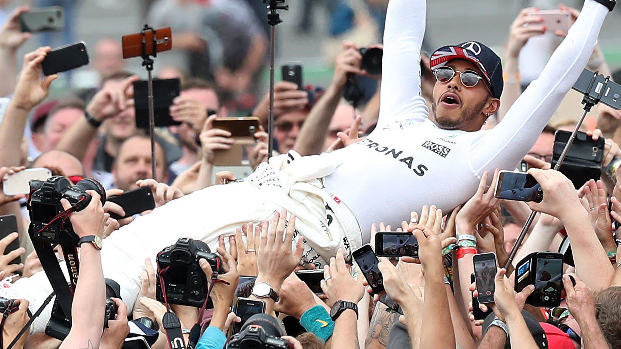 Mercedes F1 driver Lewis Hamilton celebrates winning the 2017 British Grand Prix