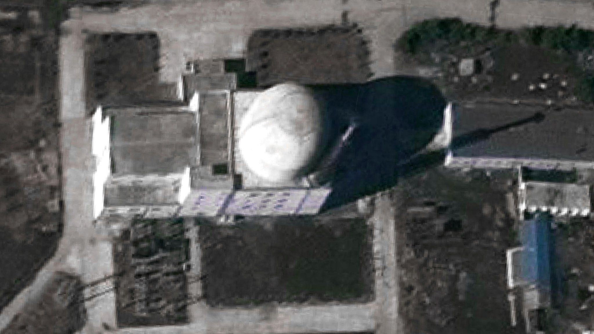 DigitalGlobe imagery showing emissions from the stack at the Yongbyon experimental light water reactor